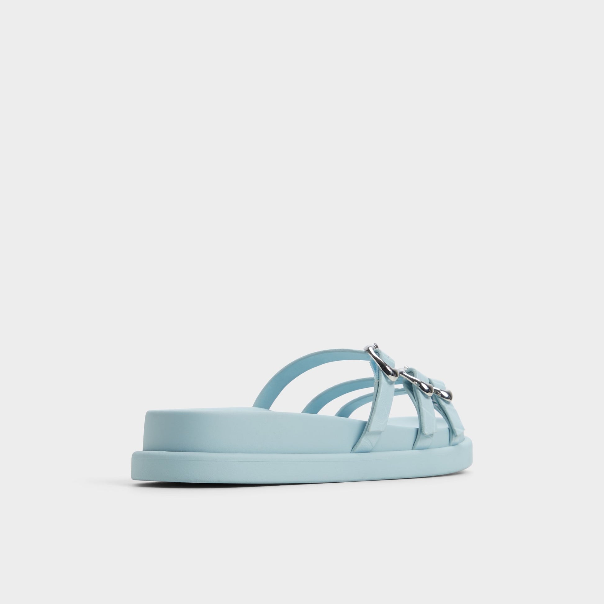 Three-quarter angle of Pastel Blue Zephyra Footbed sandal's back side