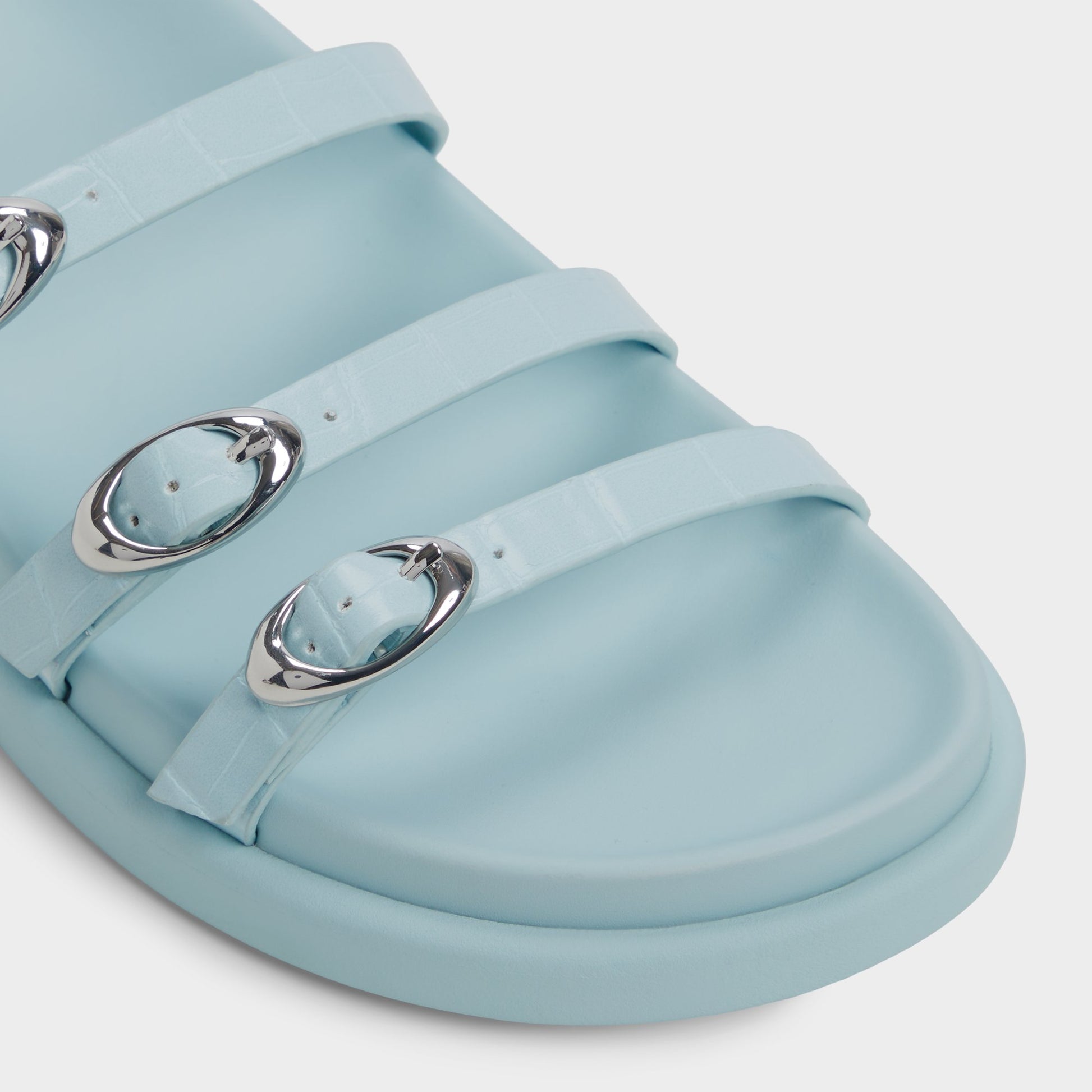 Close-up of the Pastel Blue Zephyra Footbed sandal