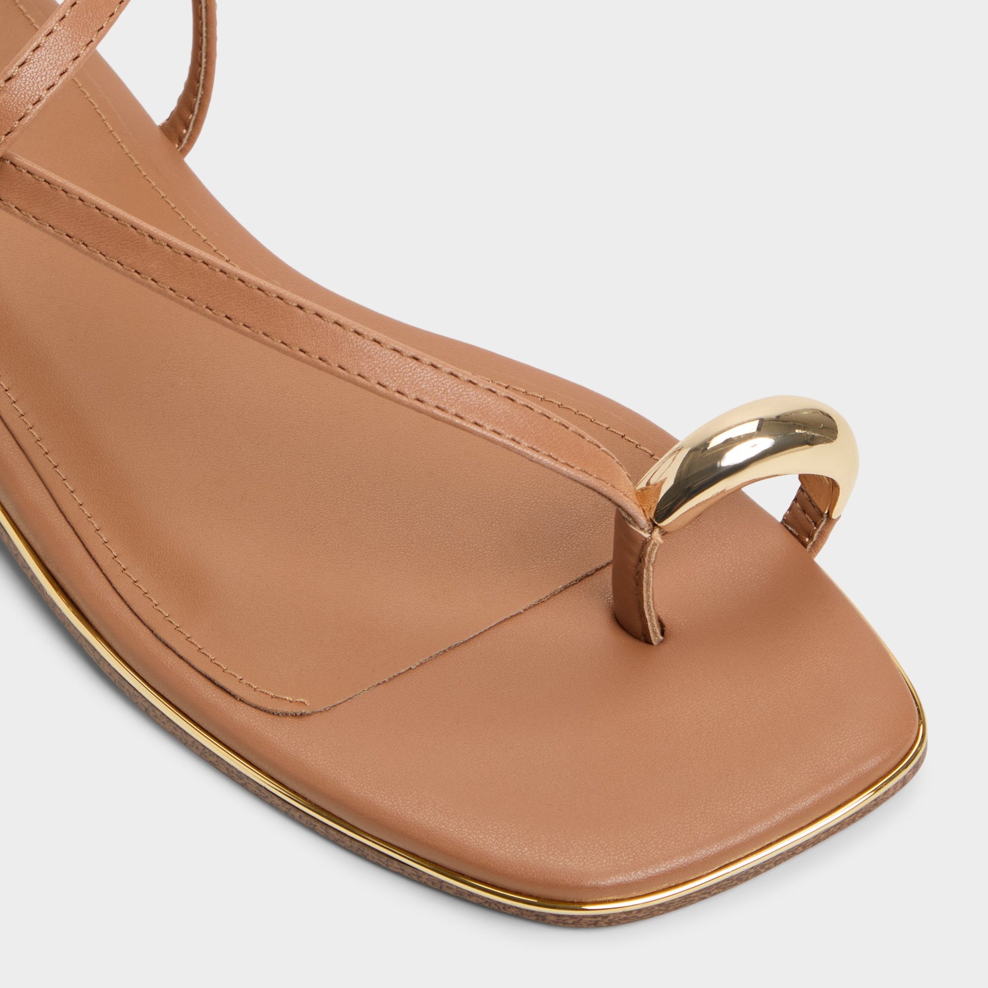 Close-up of the Medium Brown Jomalina Strappy flat sandal