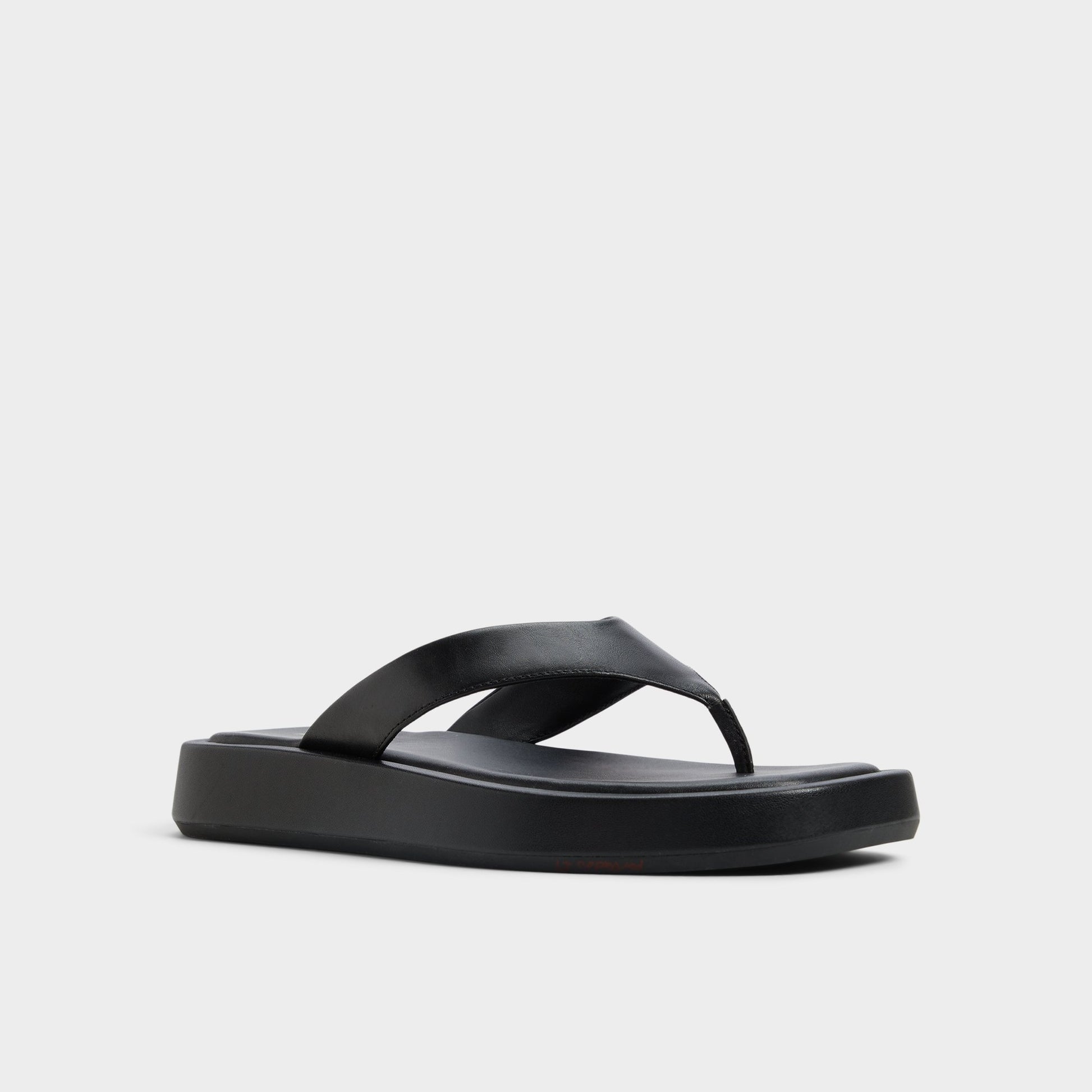 Three-quarter angle of Black Grettle Flip flop's front side