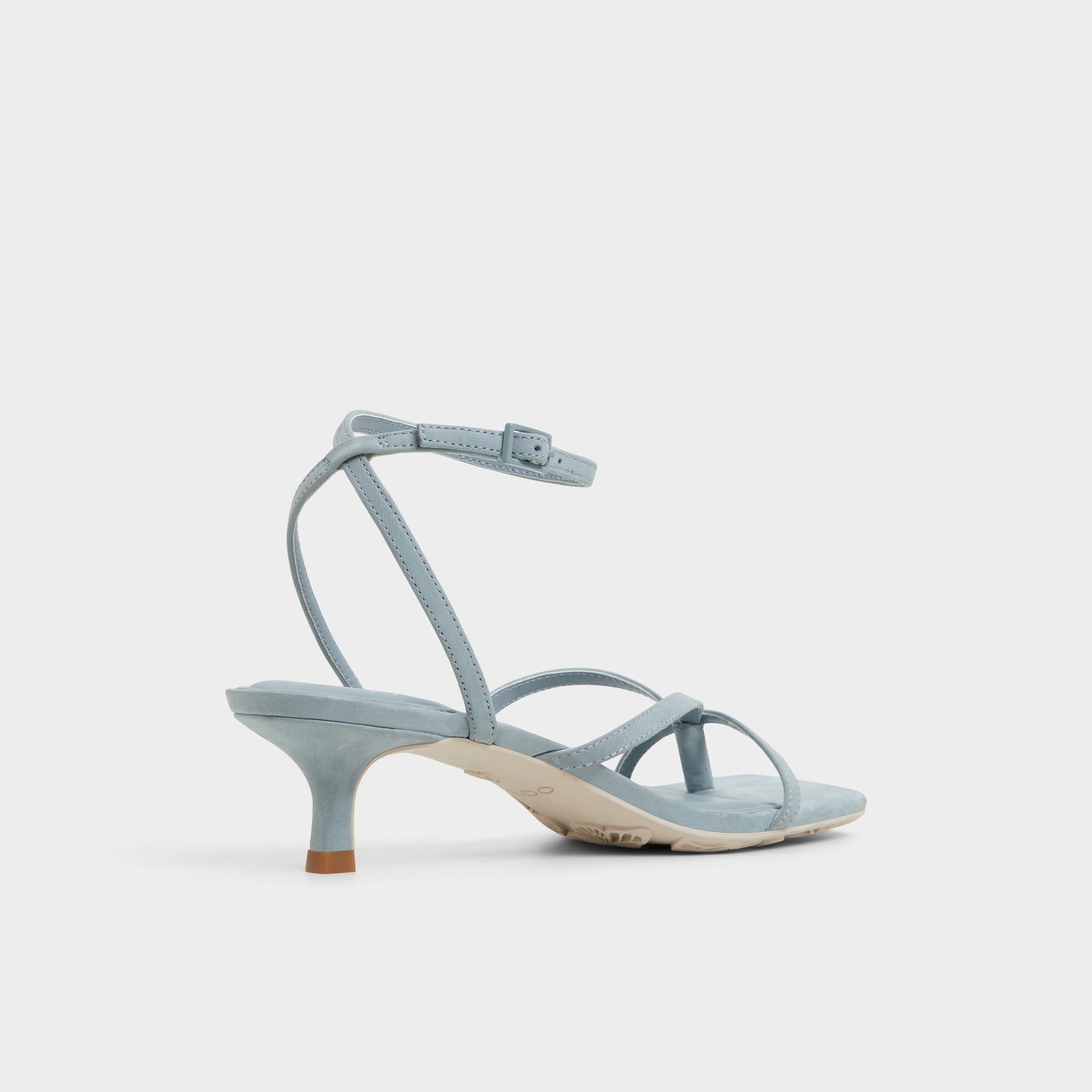 Three-quarter angle of Other Blue Soffie Strappy heeled sandal's back side