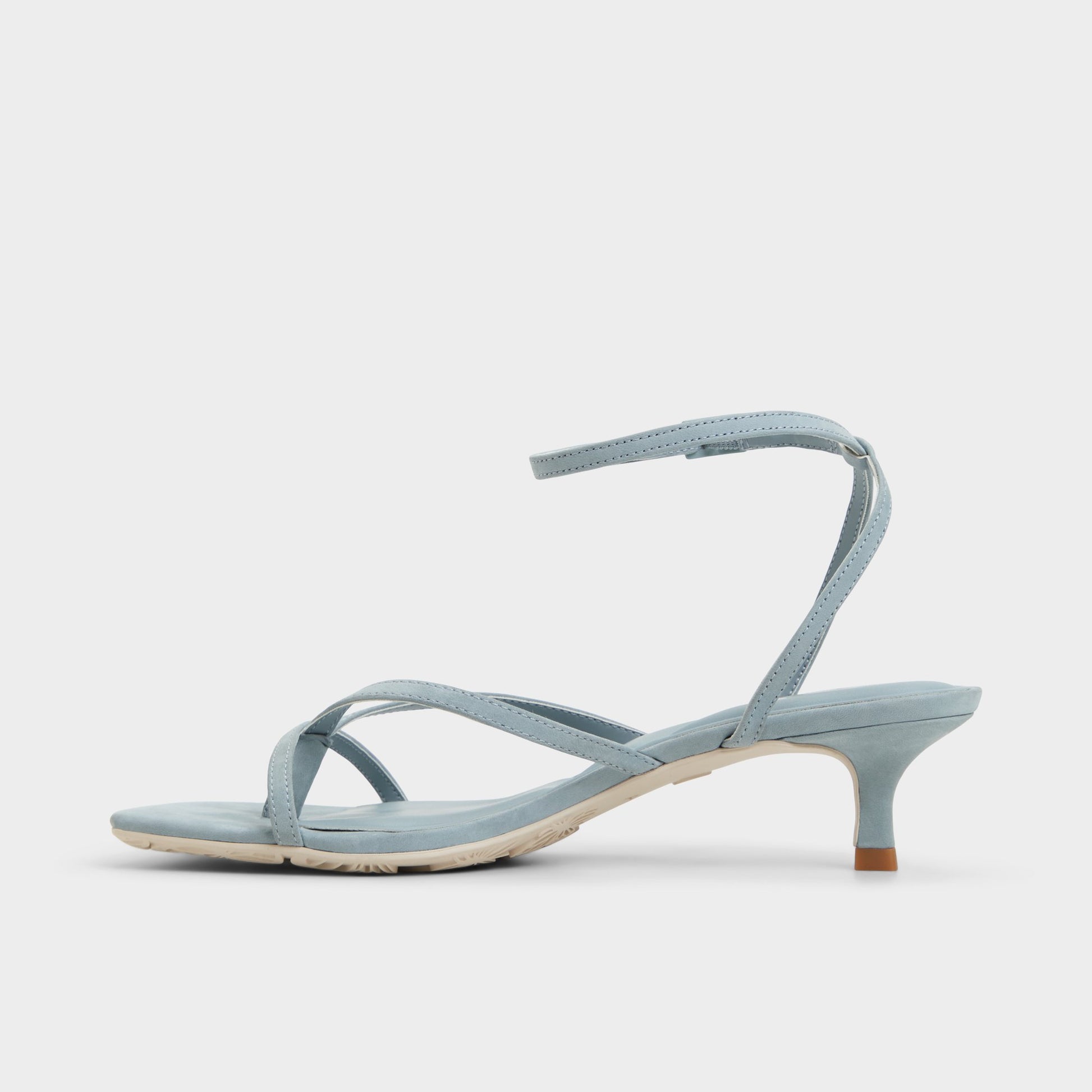 Side view of Other Blue Soffie Strappy heeled sandal