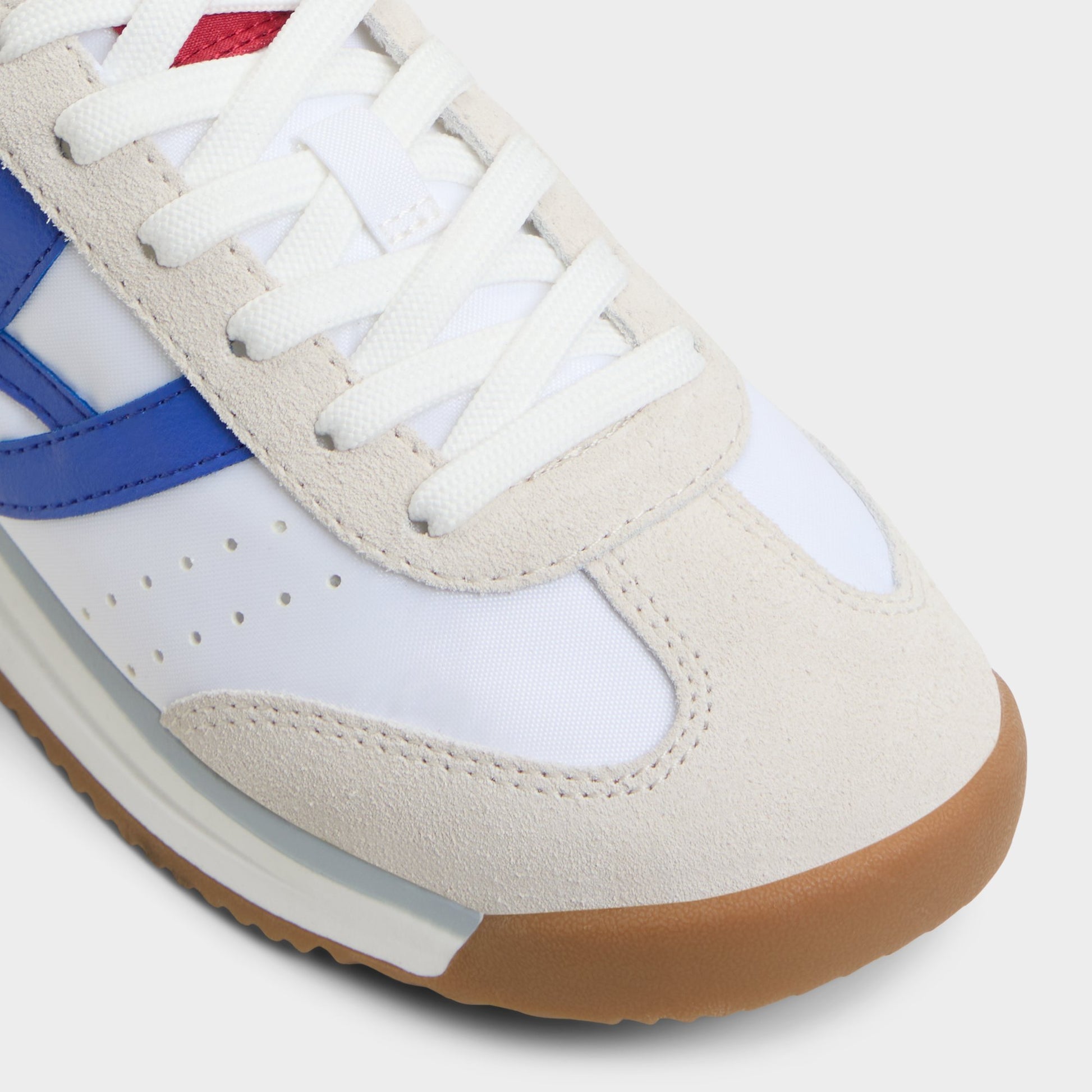 Close-up of the White/Blue Stepcount Jogger sneaker