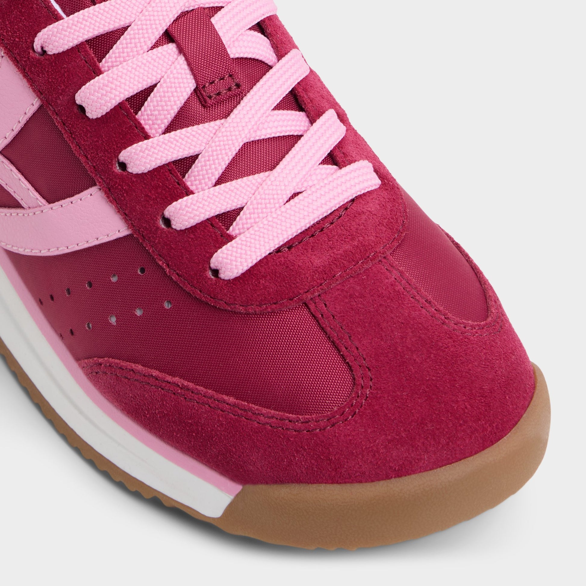 Close-up of the Dark Pink Stepcount Jogger sneaker