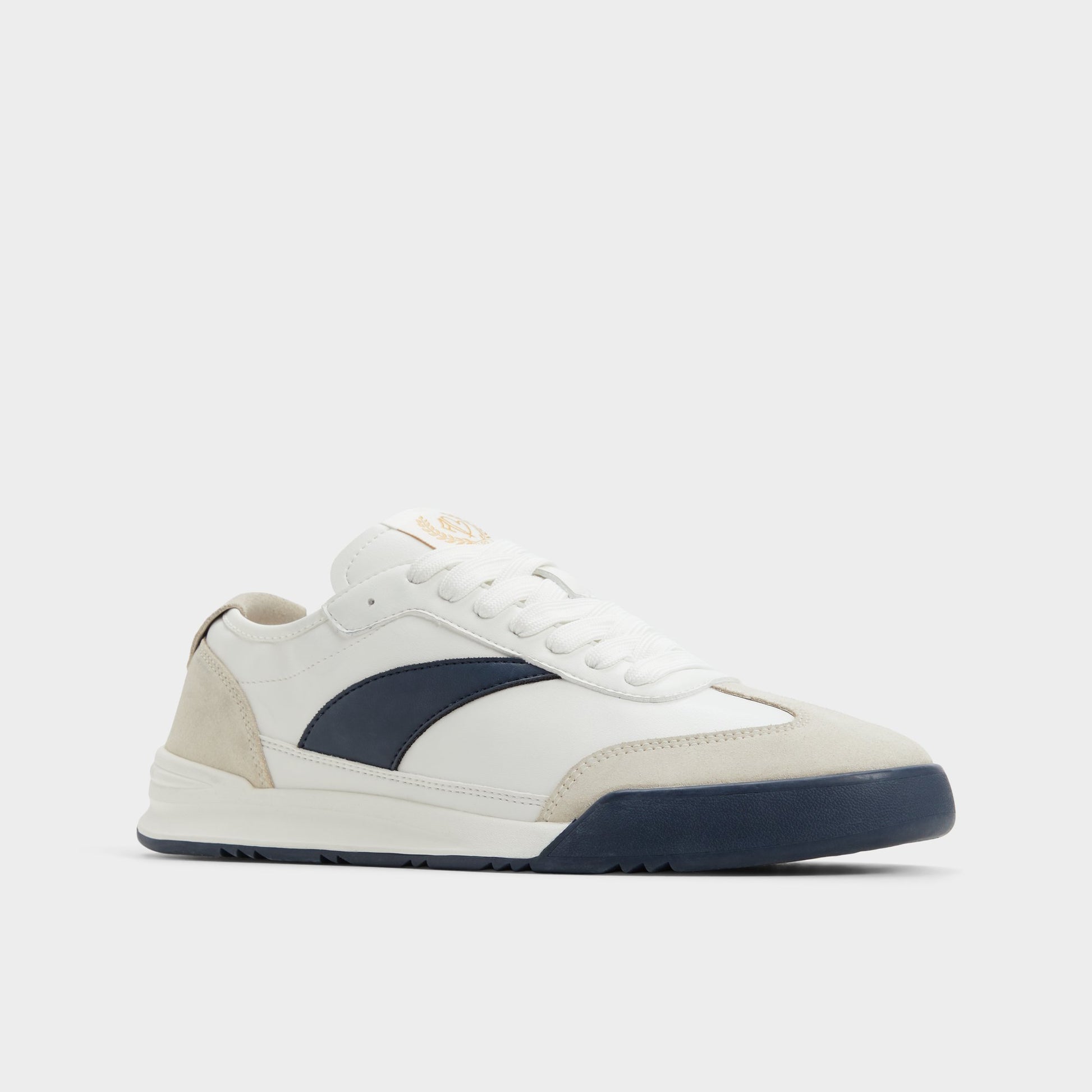 Three-quarter angle of White/Navy Clubmtl Low top sneaker's front side