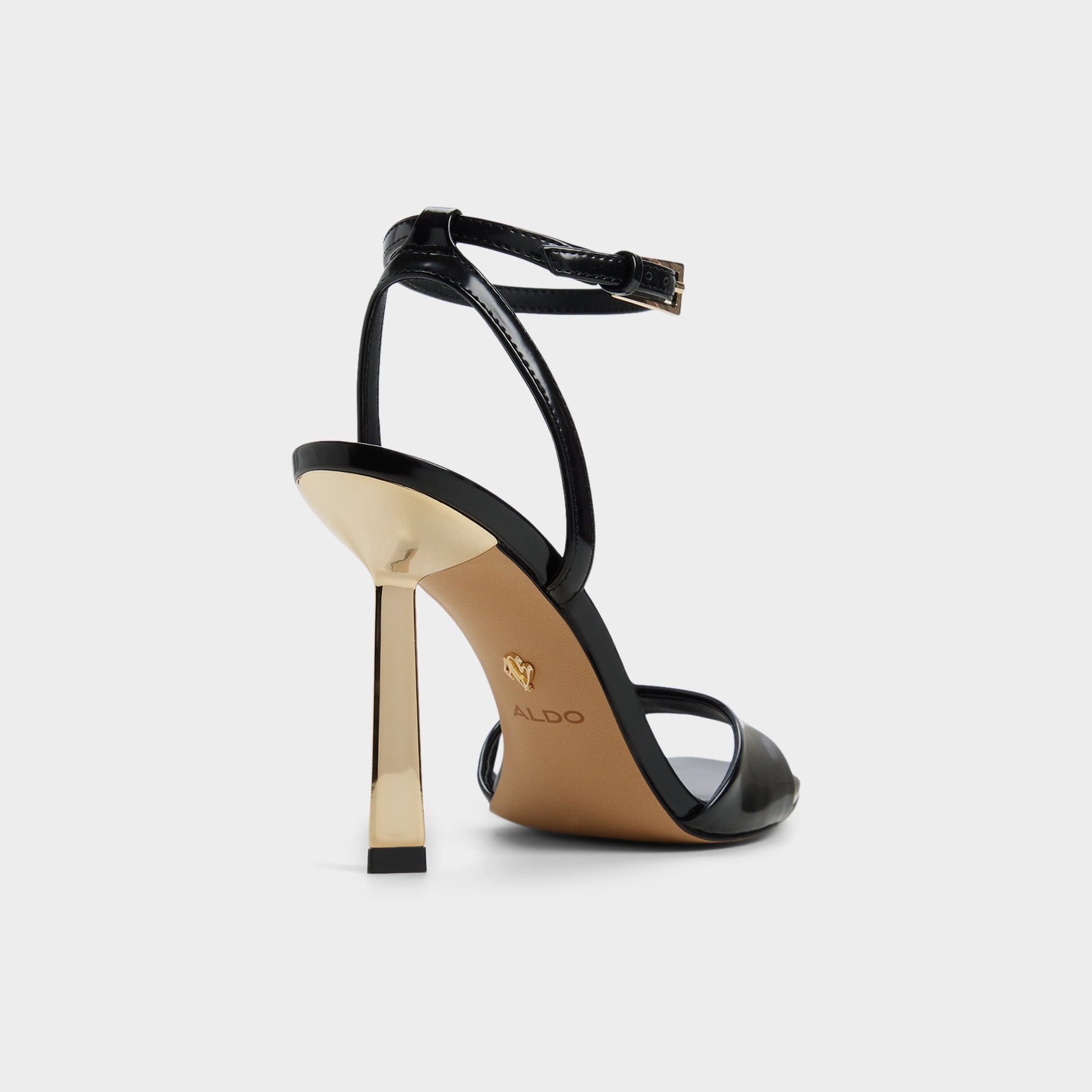 Three-quarter angle of Black Illustrious Strappy heeled sandal's back side