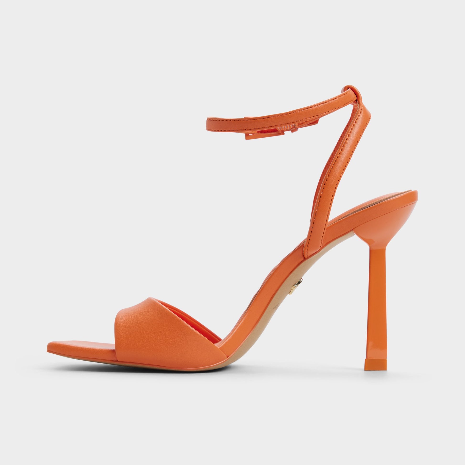 Side view of Medium Orange Illustrious Strappy heeled sandal
