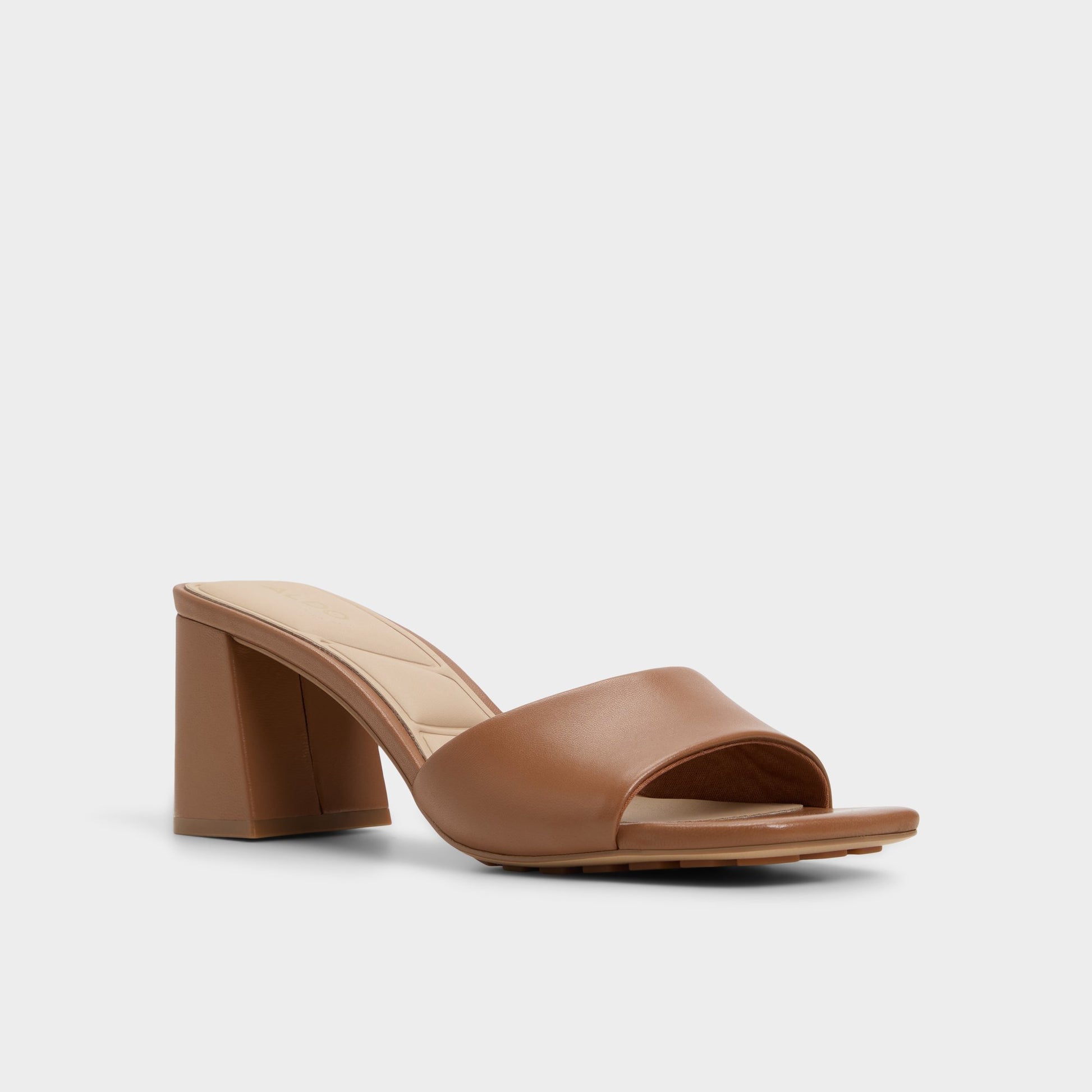 Three-quarter angle of Tan Tisha Heeled mule's front side