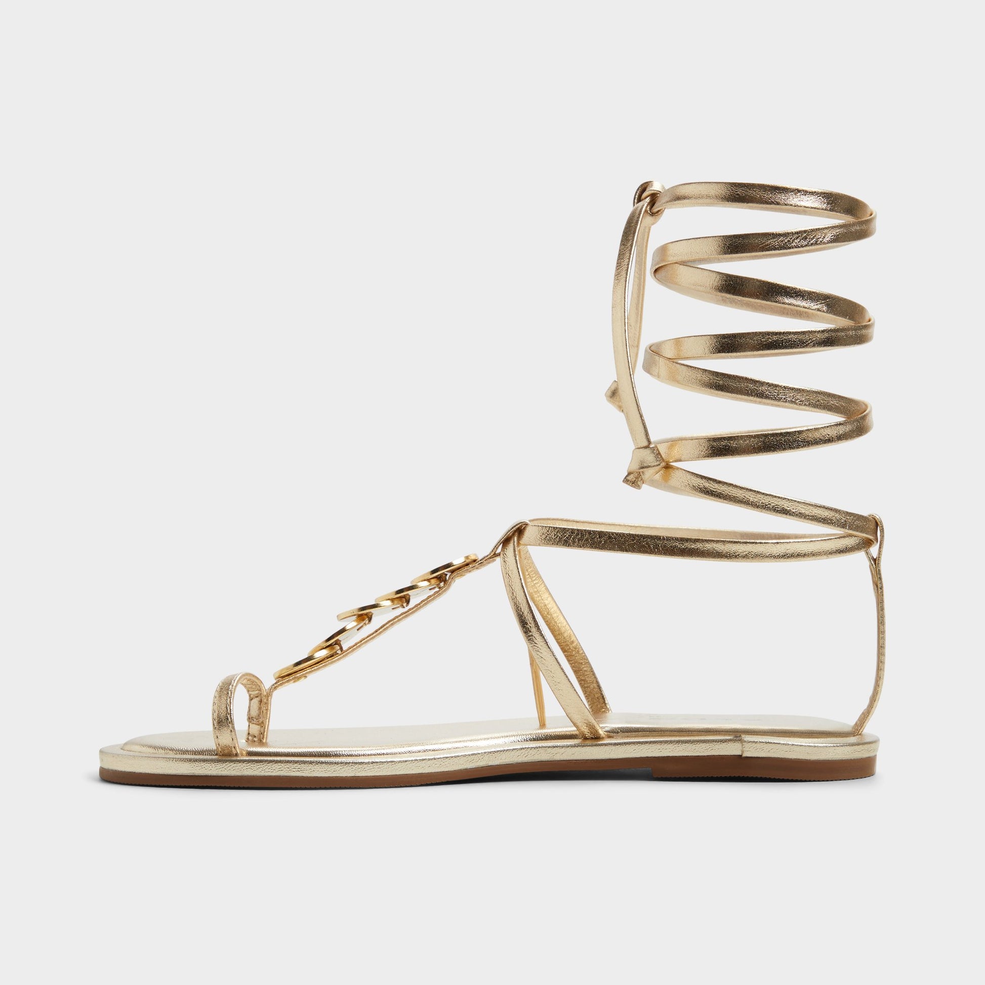 Side view of Gold Artemisa T-strap sandal