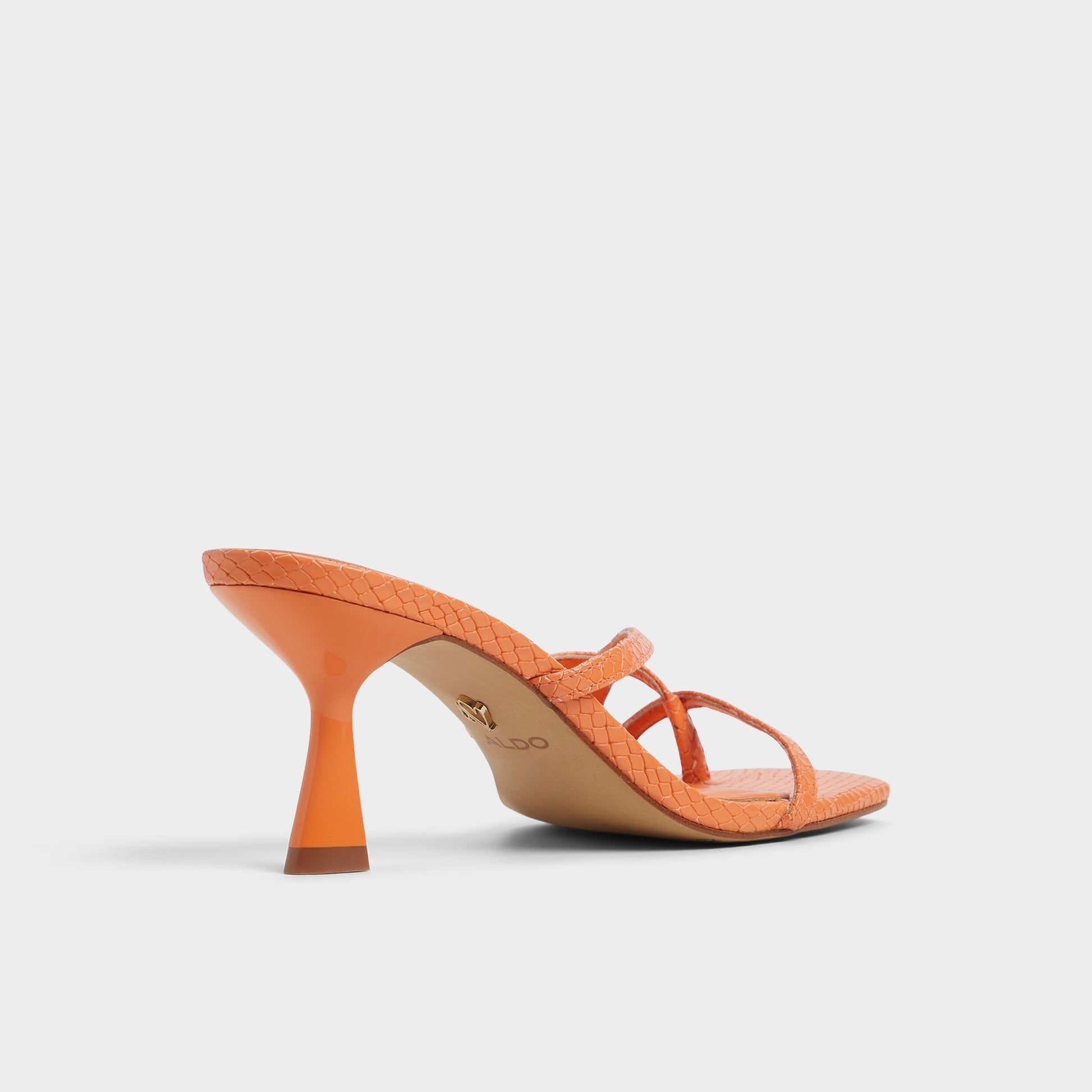 Three-quarter angle of Medium Orange Calypsa Strappy heeled sandal's back side