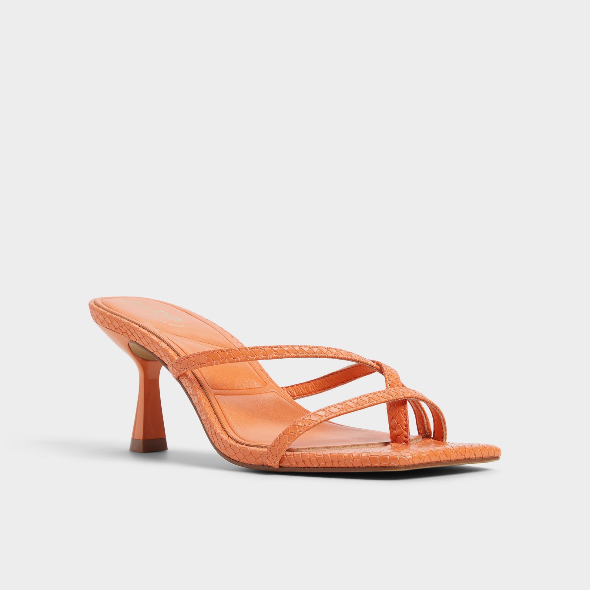 Three-quarter angle of Medium Orange Calypsa Strappy heeled sandal's front side