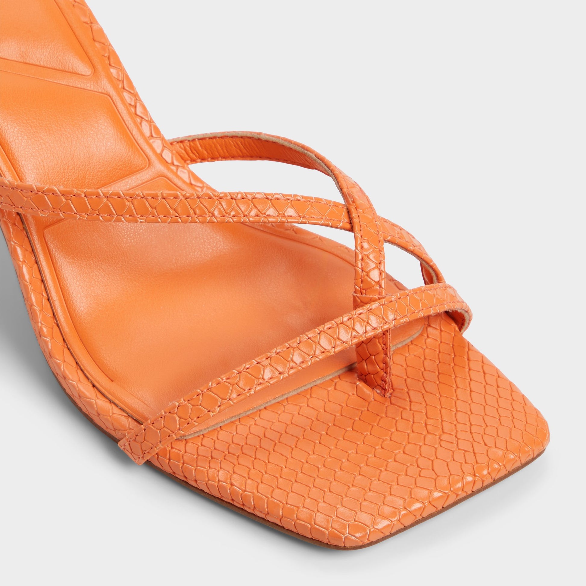 Close-up of the Medium Orange Calypsa Strappy heeled sandal