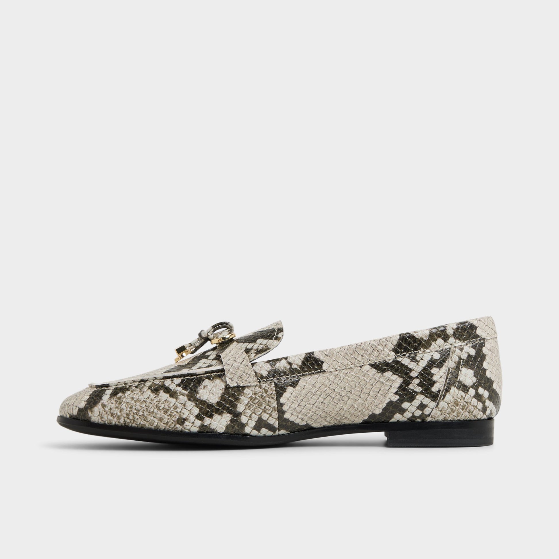 Side view of White/Black Ybilide Loafer