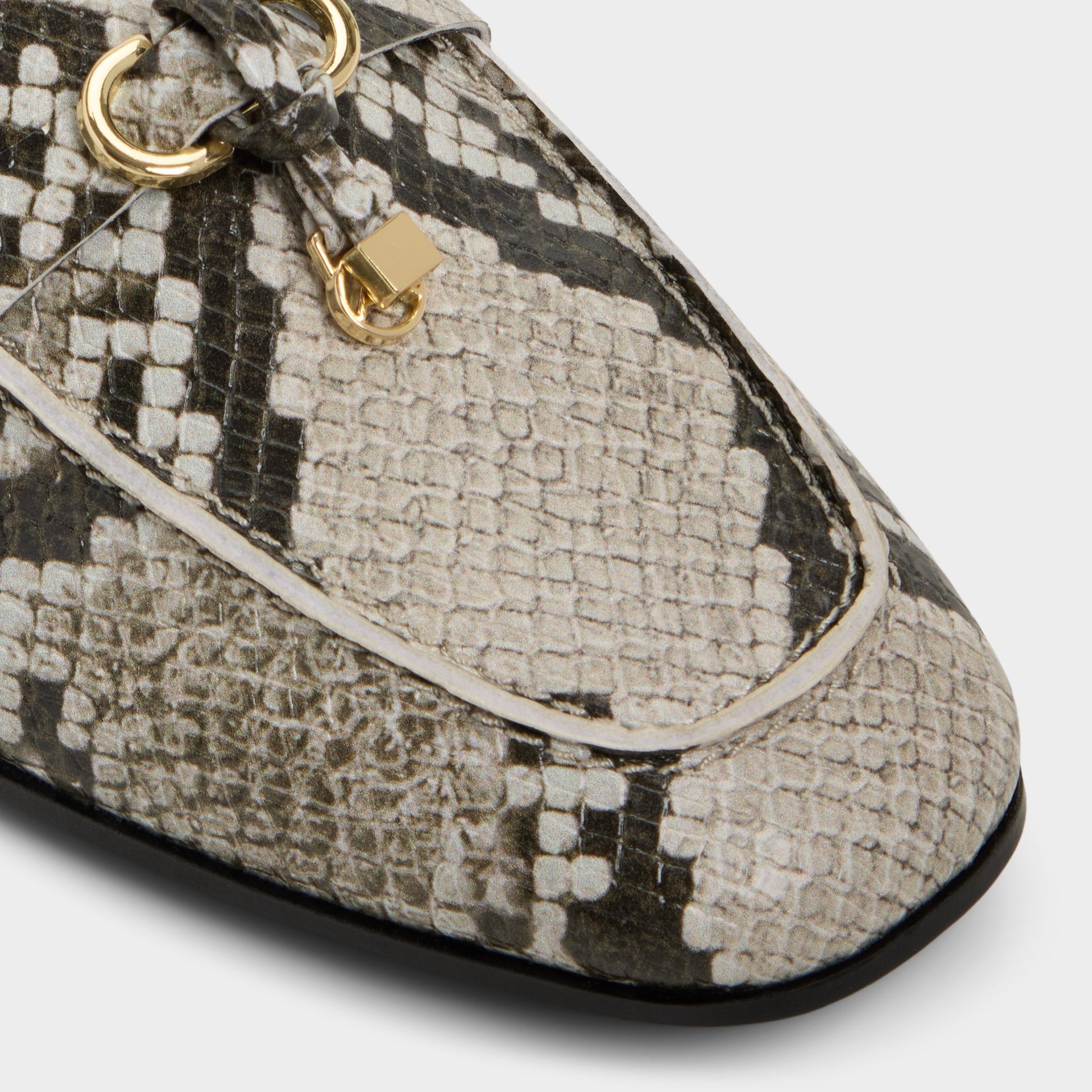 Close-up of the White/Black Ybilide Loafer