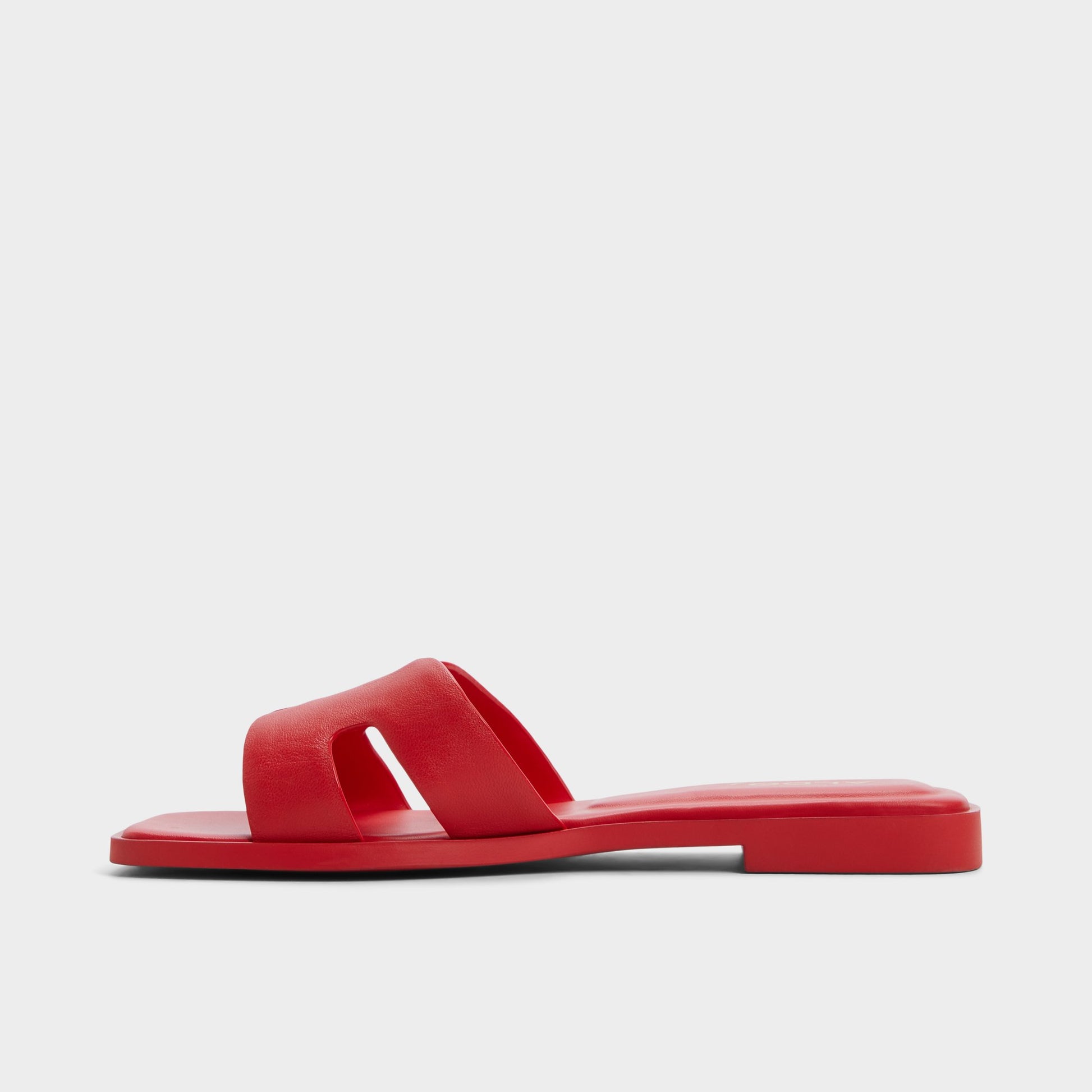 Side view of Bright red Itsandal Slide sandal