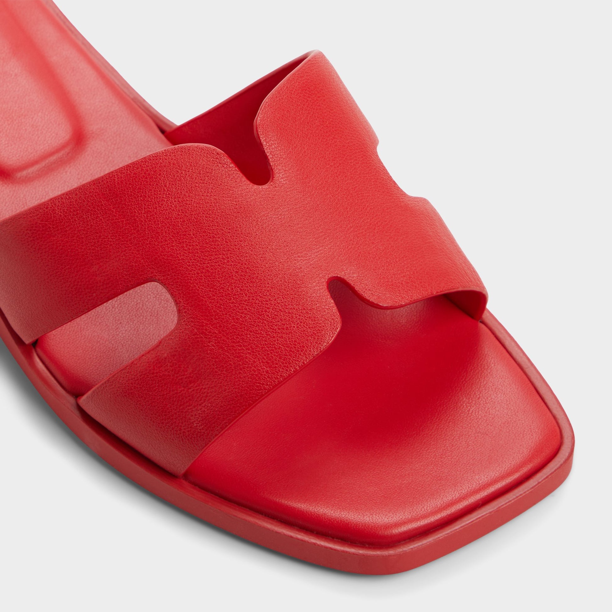 Close-up of the Bright red Itsandal Slide sandal