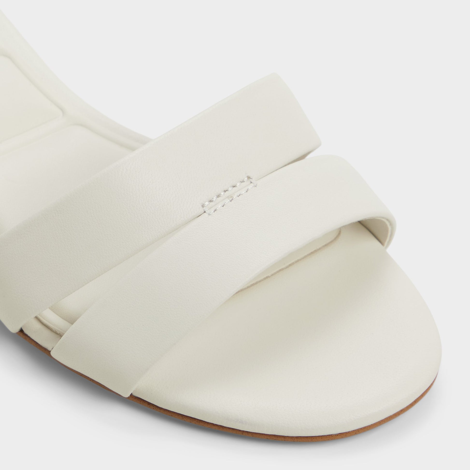 Close-up of the White/Bone Scarletta Heeled mule