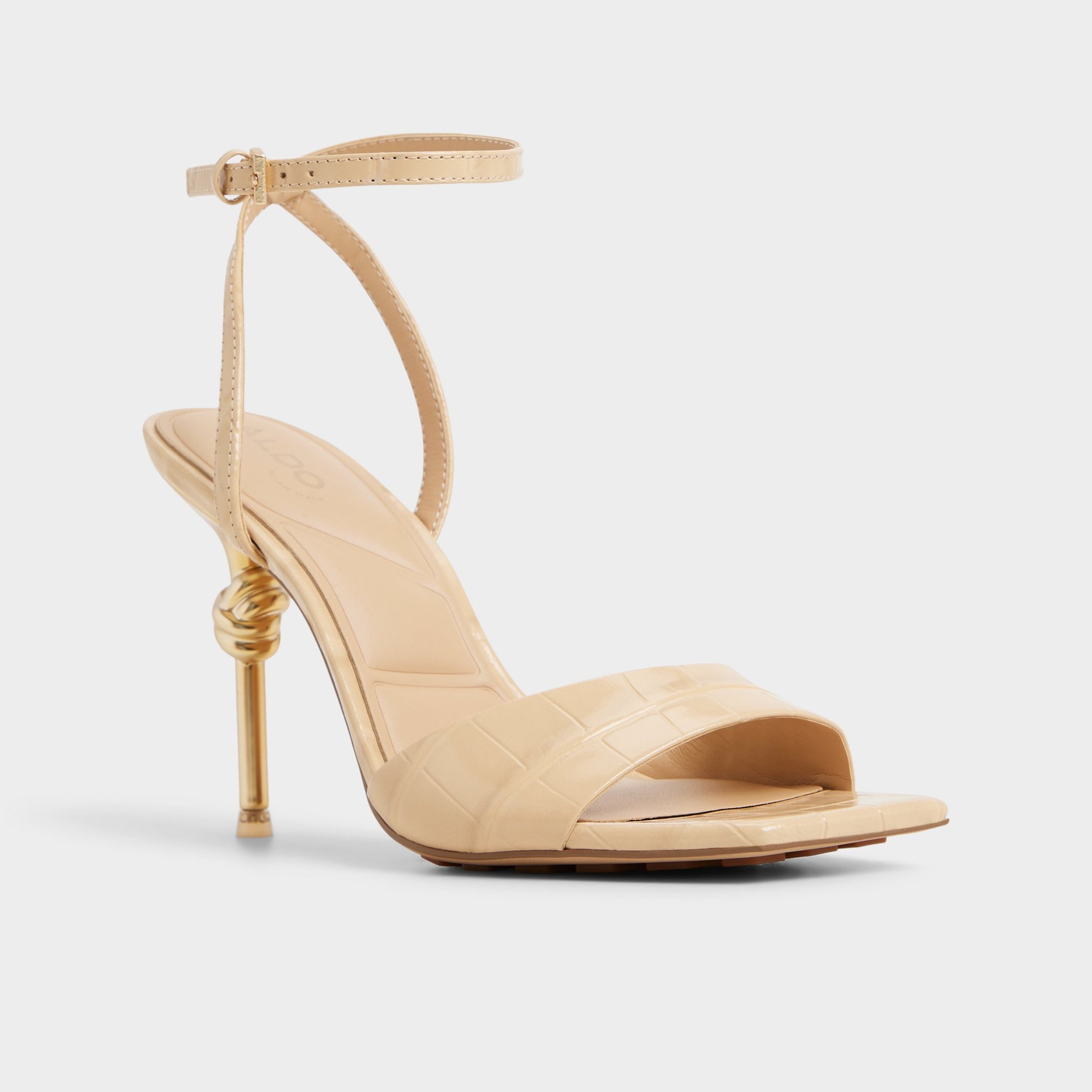 Three-quarter angle of Medium Beige Harmonious Strappy heeled sandal's front side