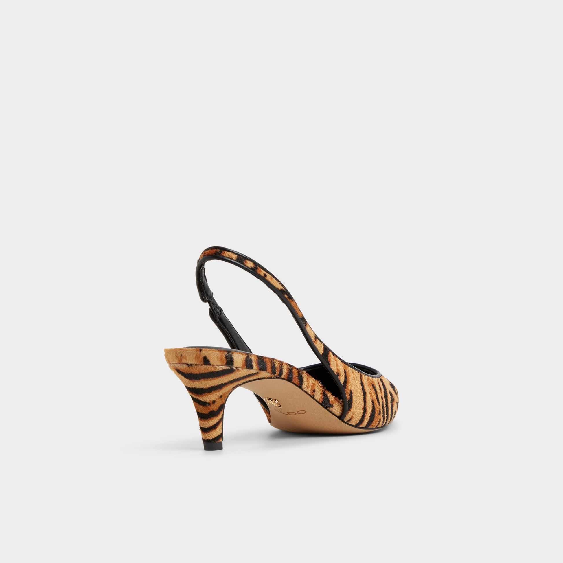Three-quarter angle of Open Brown Leanah Slingback heel's back side