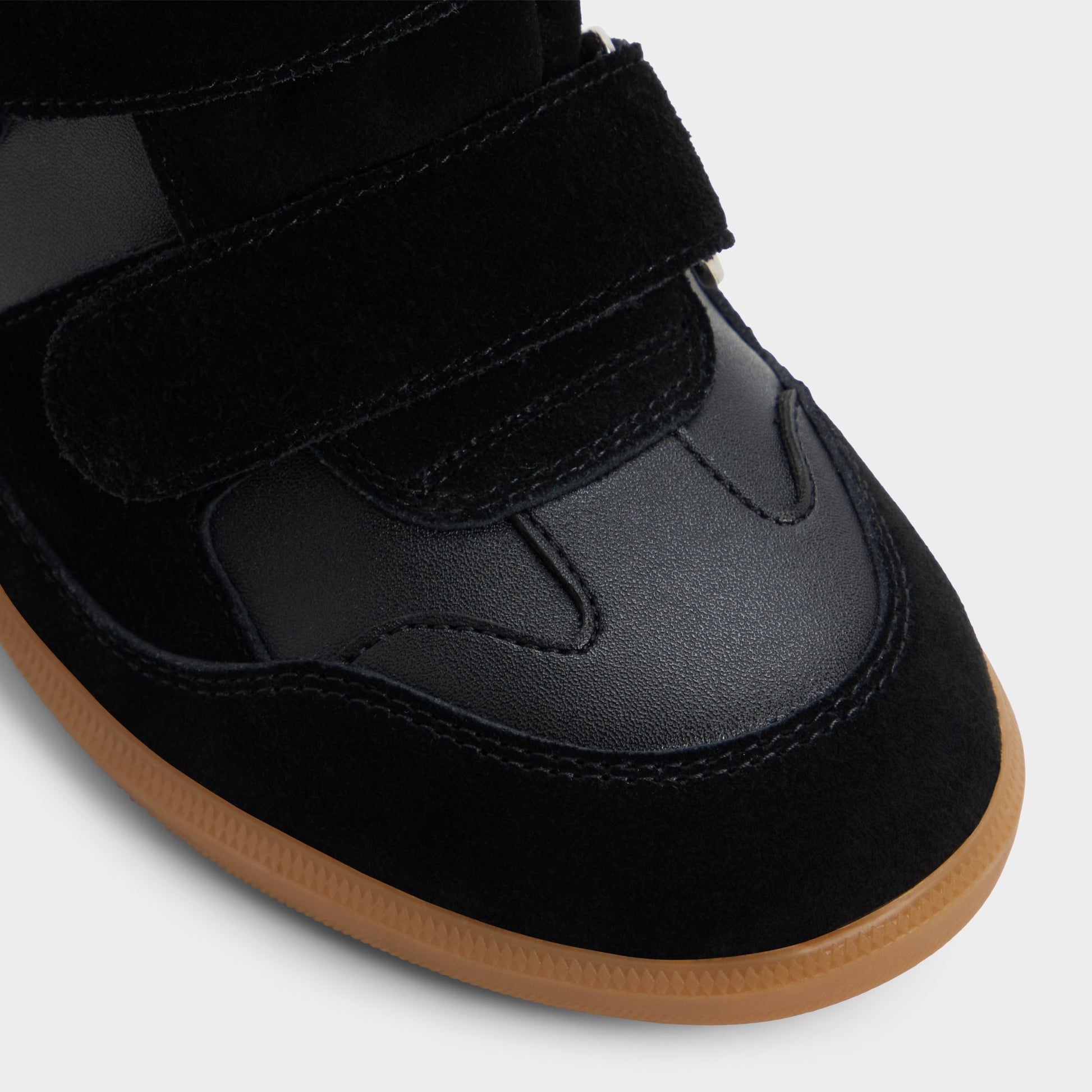 Close-up of the Black Bellissamo Wedge sneaker