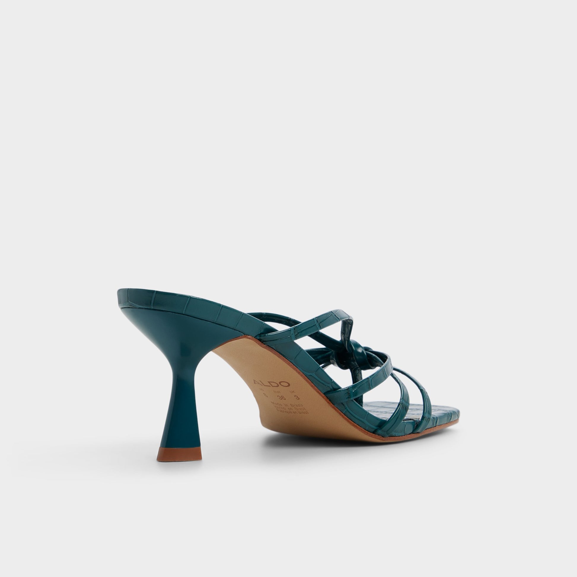 Three-quarter angle of Other green Lumera Heeled mule's back side