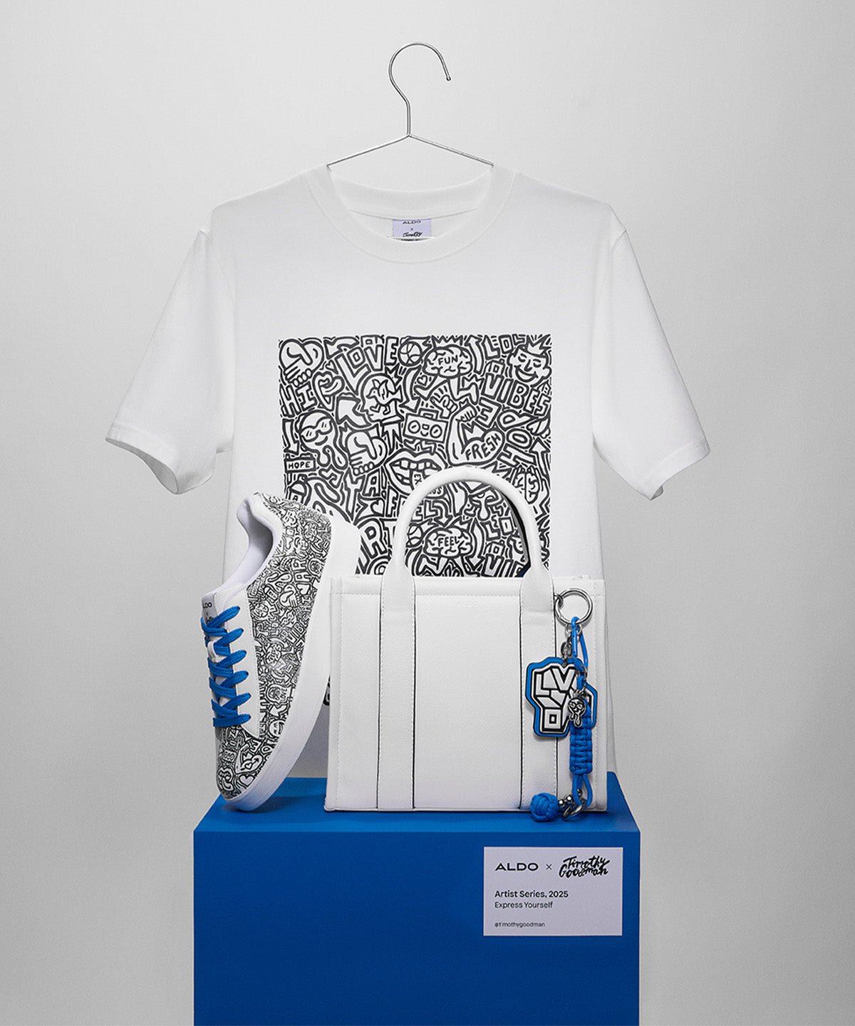 Cluster of Timothy Goodman's t-shirt, sneaker and tote bag