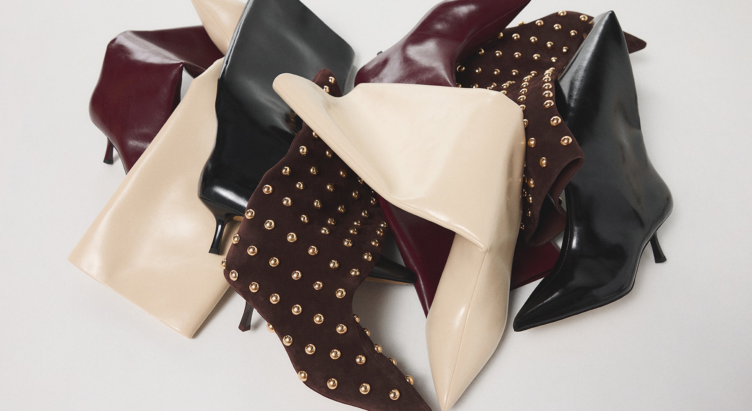 Cluster of women's black boots