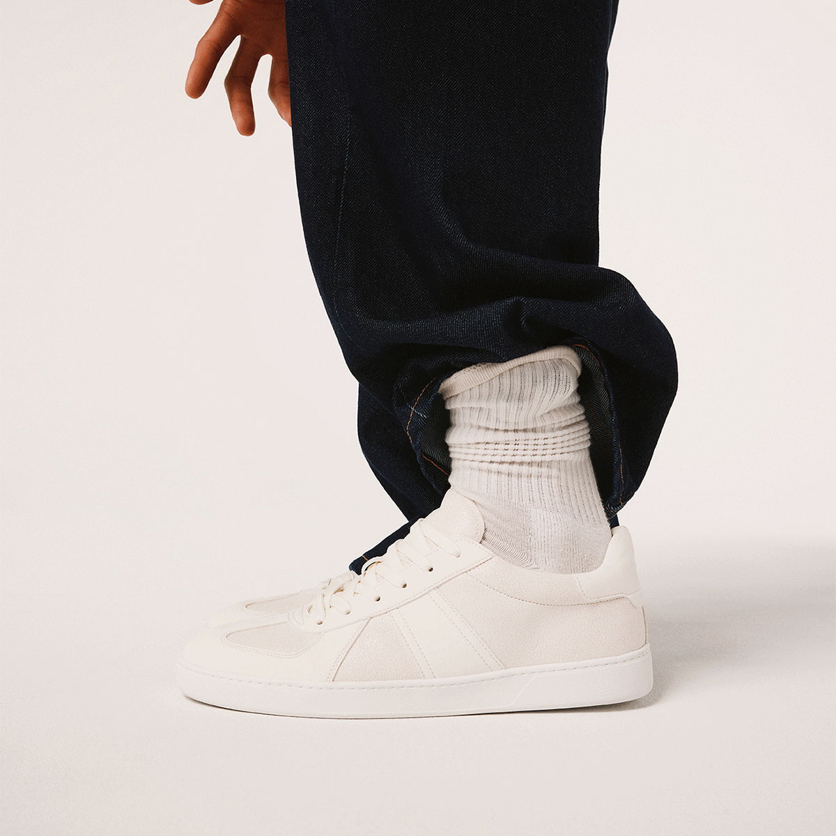 Cluster of men's new white sneakers