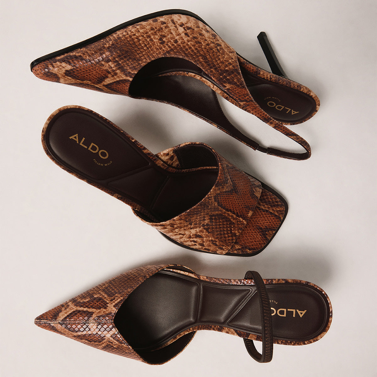 Women's cluster of snake print heels