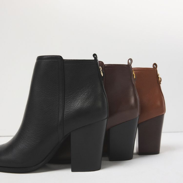 The Noemia block ankle bootie, featuring three colors; black, deep brown, and caramel brown.