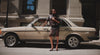 A GIF featuring a woman in a brown jacket, matching brown heels, and a brown clutch standing beside a beige vintage car. Alongside, a man is seated in a restaurant setting, paired with a close-up shot of a woman holding a black clutch accented with a gold ring detail.