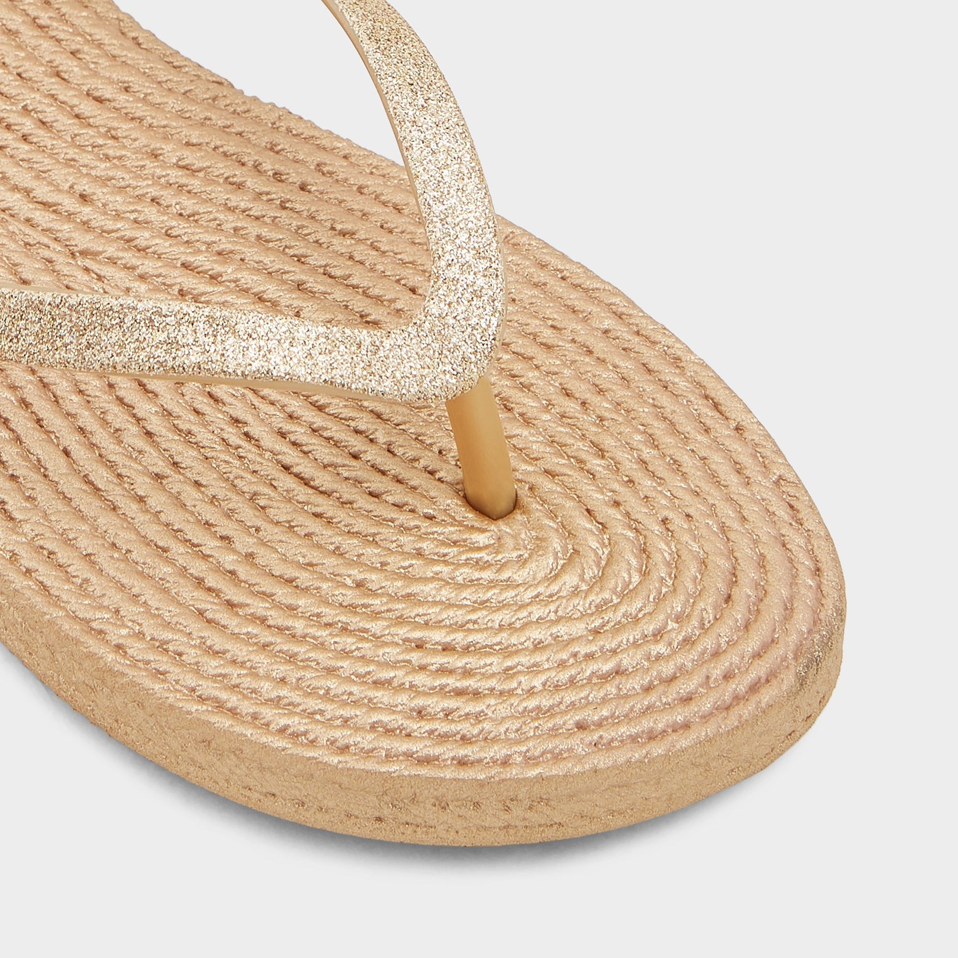 Close-up of the Gold Aloomba Flip flop