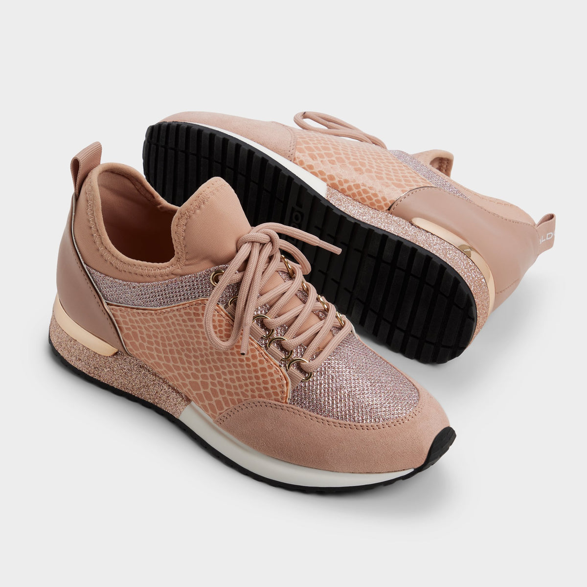 Highlighted view of a pair of Rose gold Courtwood Sneakers