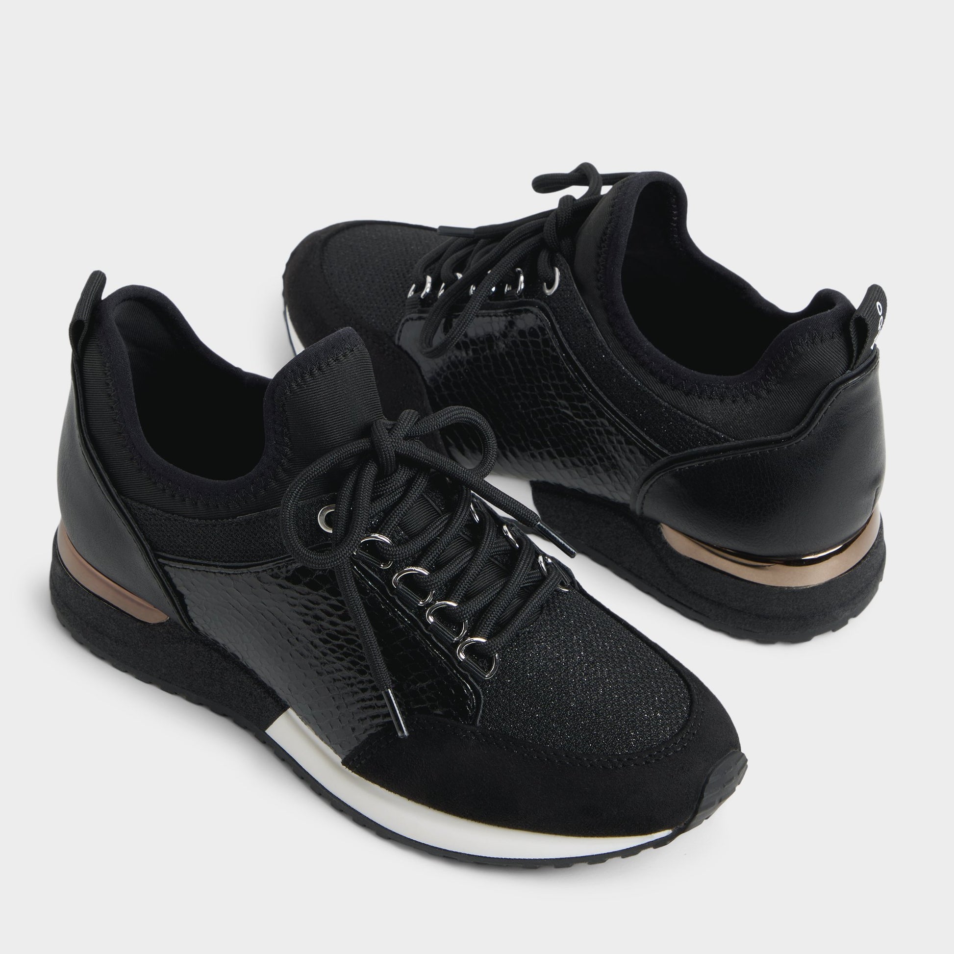 Highlighted view of a pair of Black Courtwood Sneakers