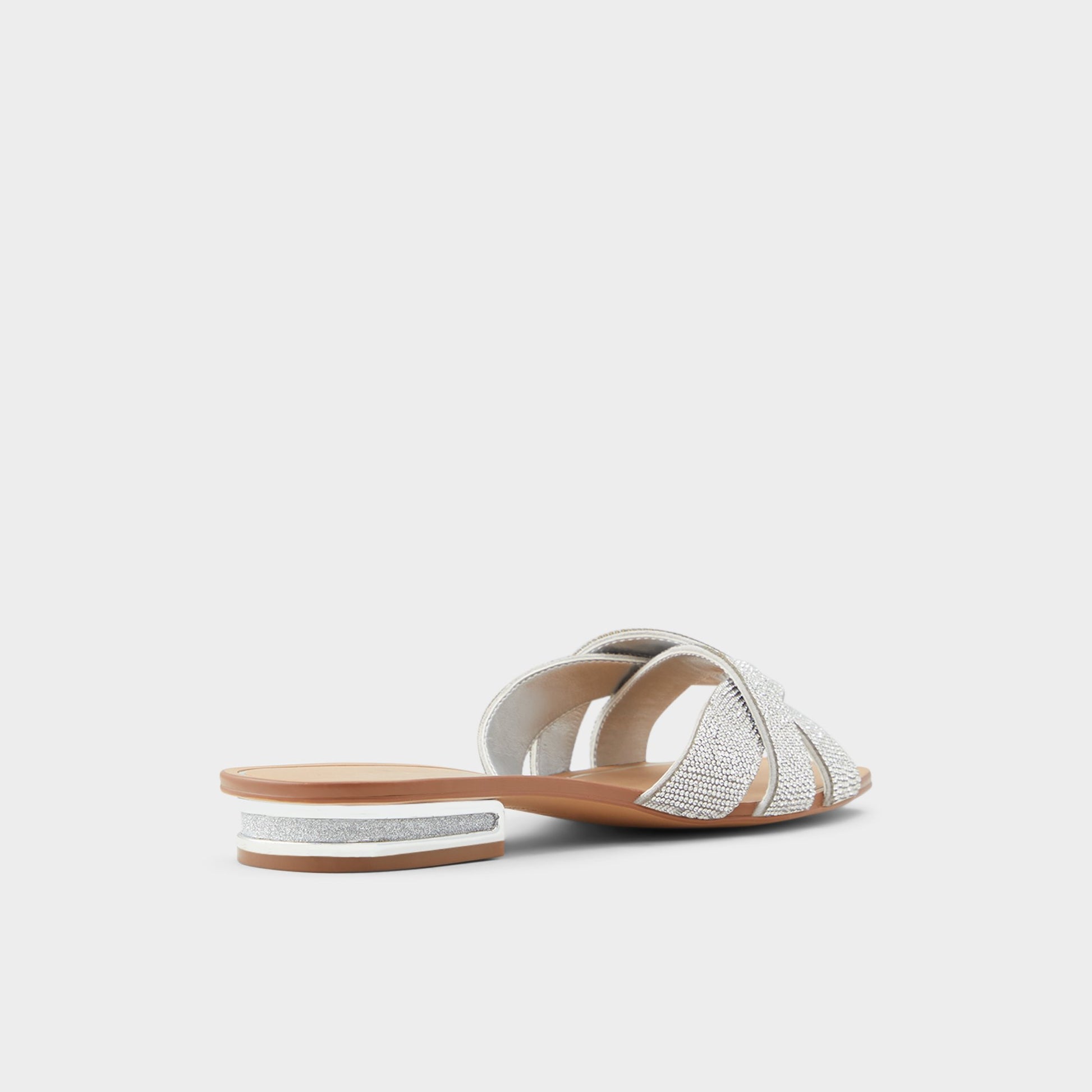 Three-quarter angle of Silver Coredith Slide sandal's back side