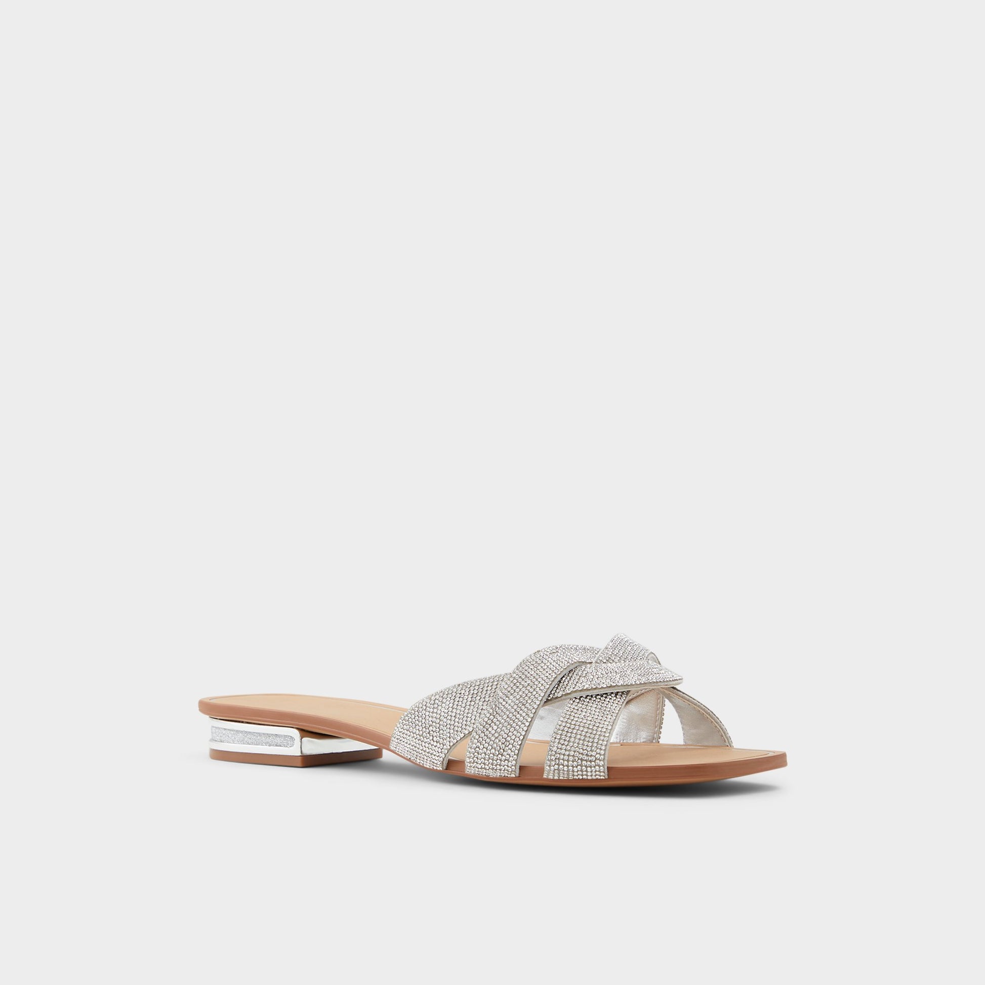 Three-quarter angle of Silver Coredith Slide sandal's front side