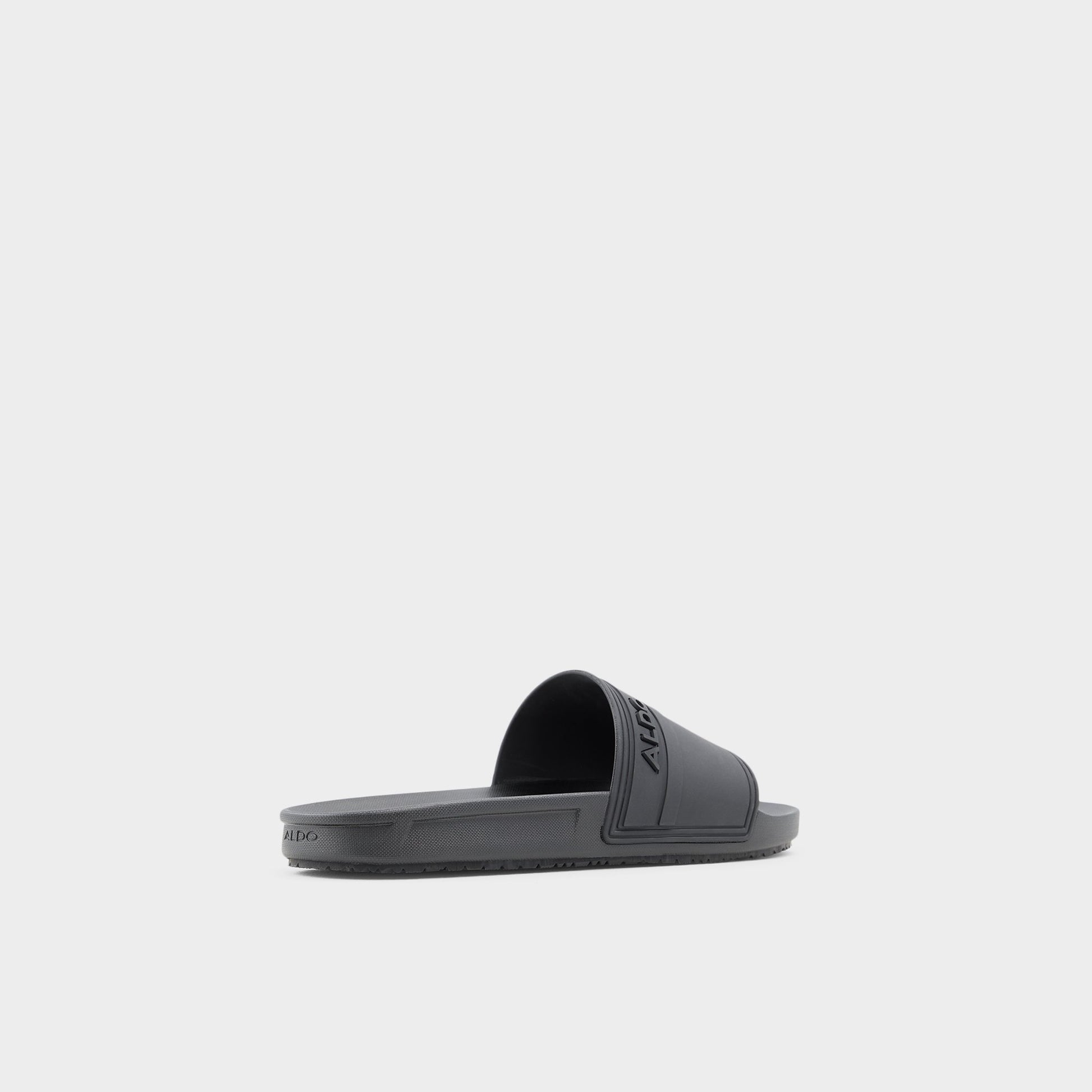 Three-quarter angle of Black Dinmore Slide sandal's back side