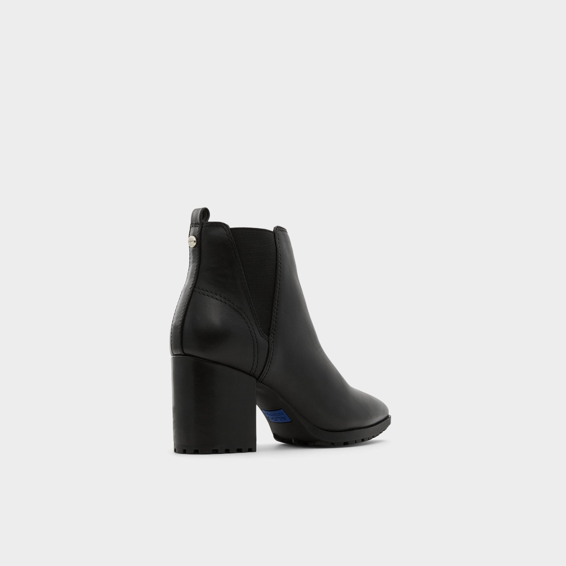 Three-quarter angle of Black Qirarith Chelsea boot's back side