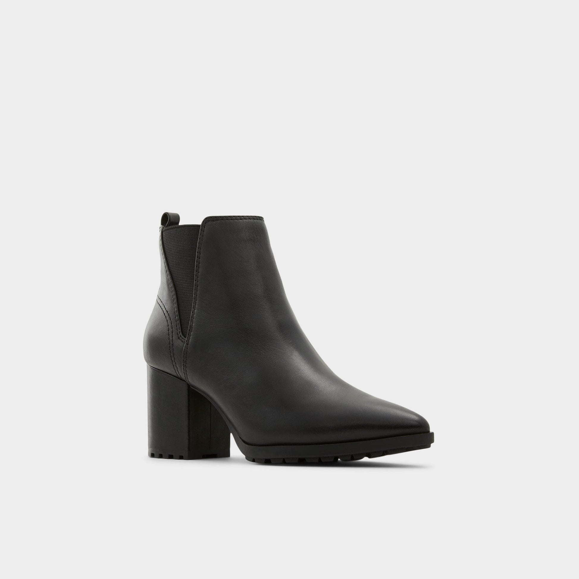 Three-quarter angle of Black Qirarith Chelsea boot's front side