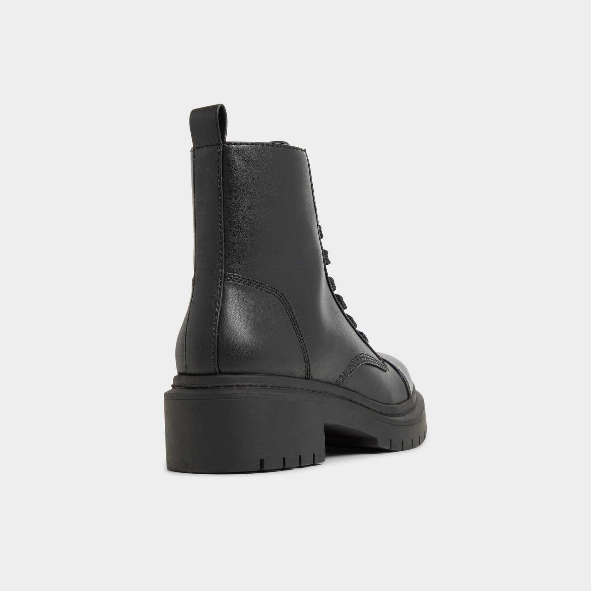 Three-quarter angle of Black Goer Combat ankle boot's back side