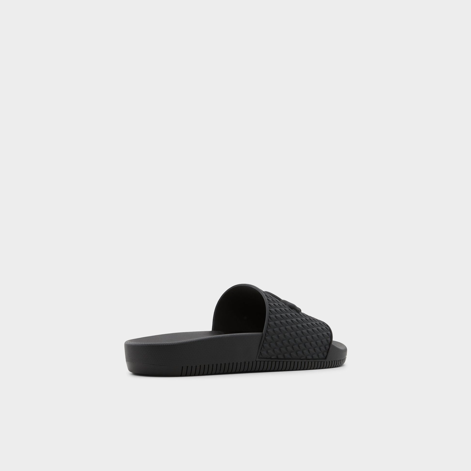 Three-quarter angle of Black Kedau Slide sandal's back side