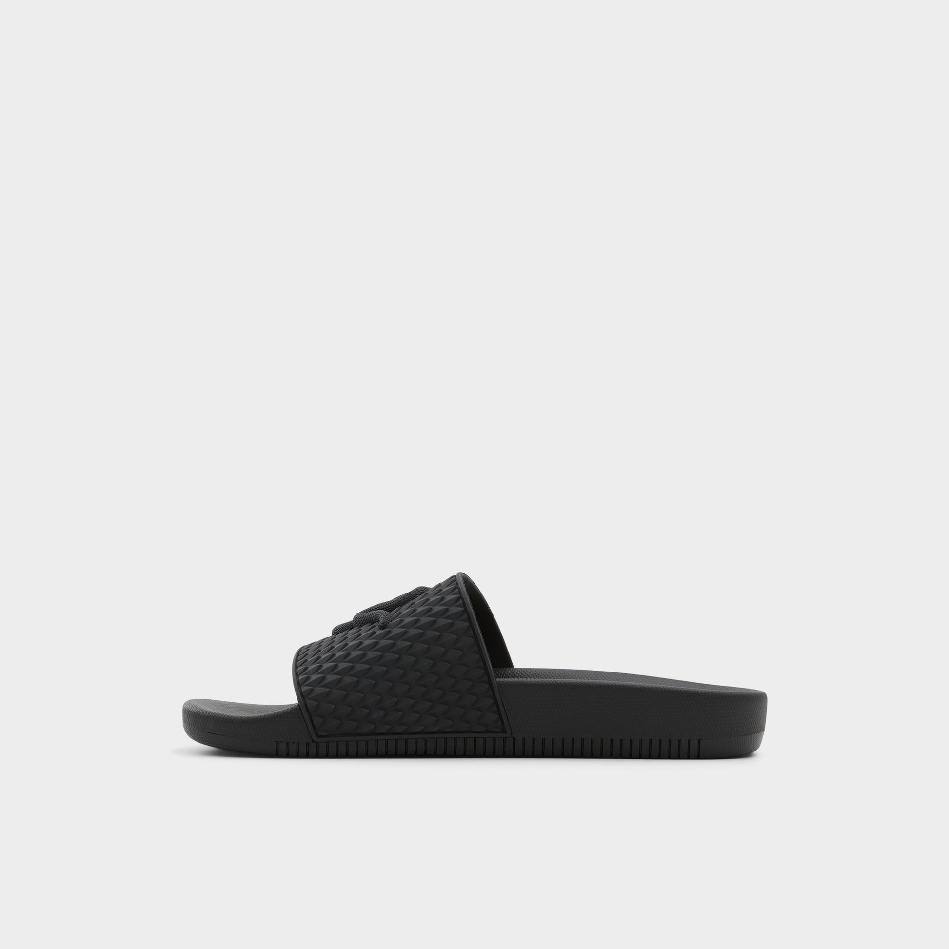 Side view of Black Kedau Slide sandal