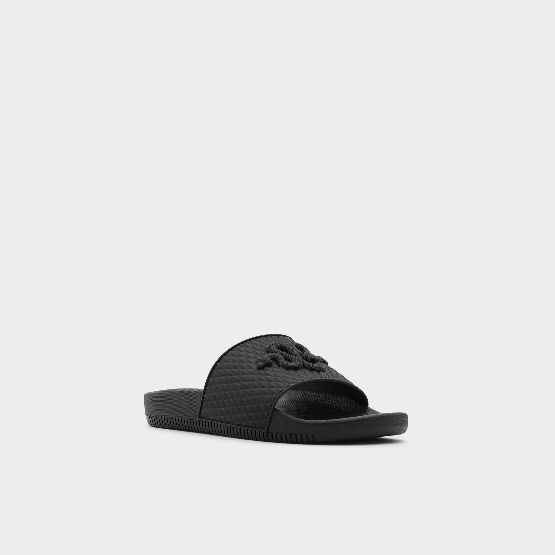 Three-quarter angle of Black Kedau Slide sandal's front side