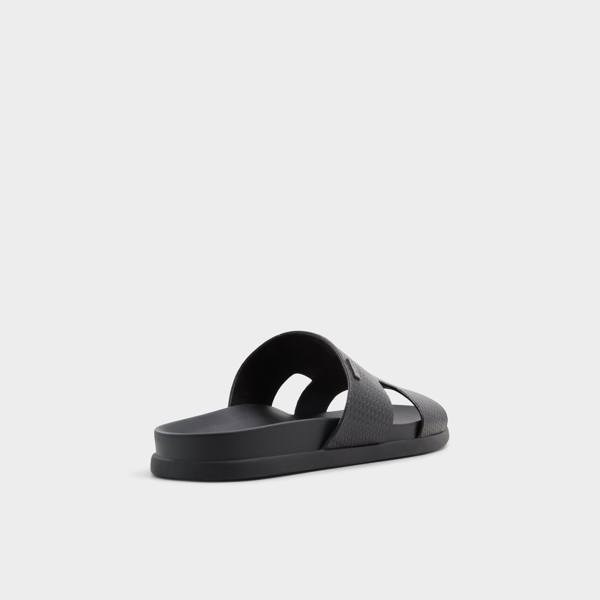 Three-quarter angle of Black Mondi Slide sandal's back side