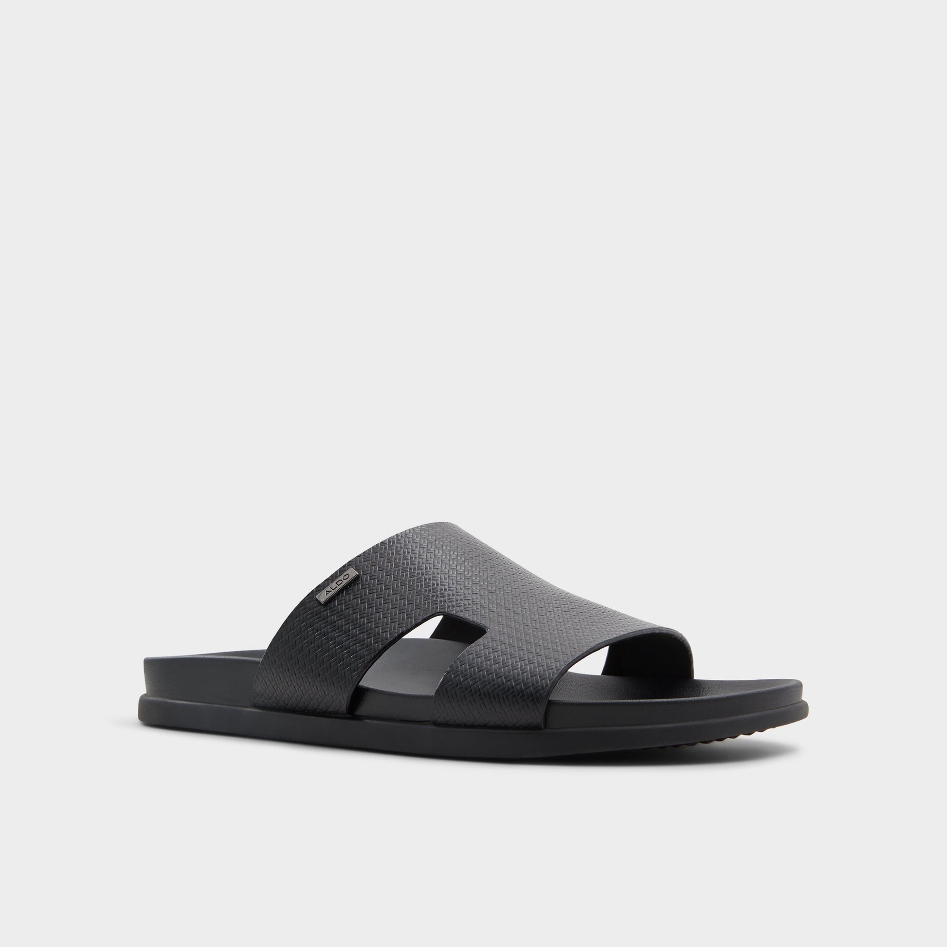 Three-quarter angle of Black Mondi Slide sandal's front side