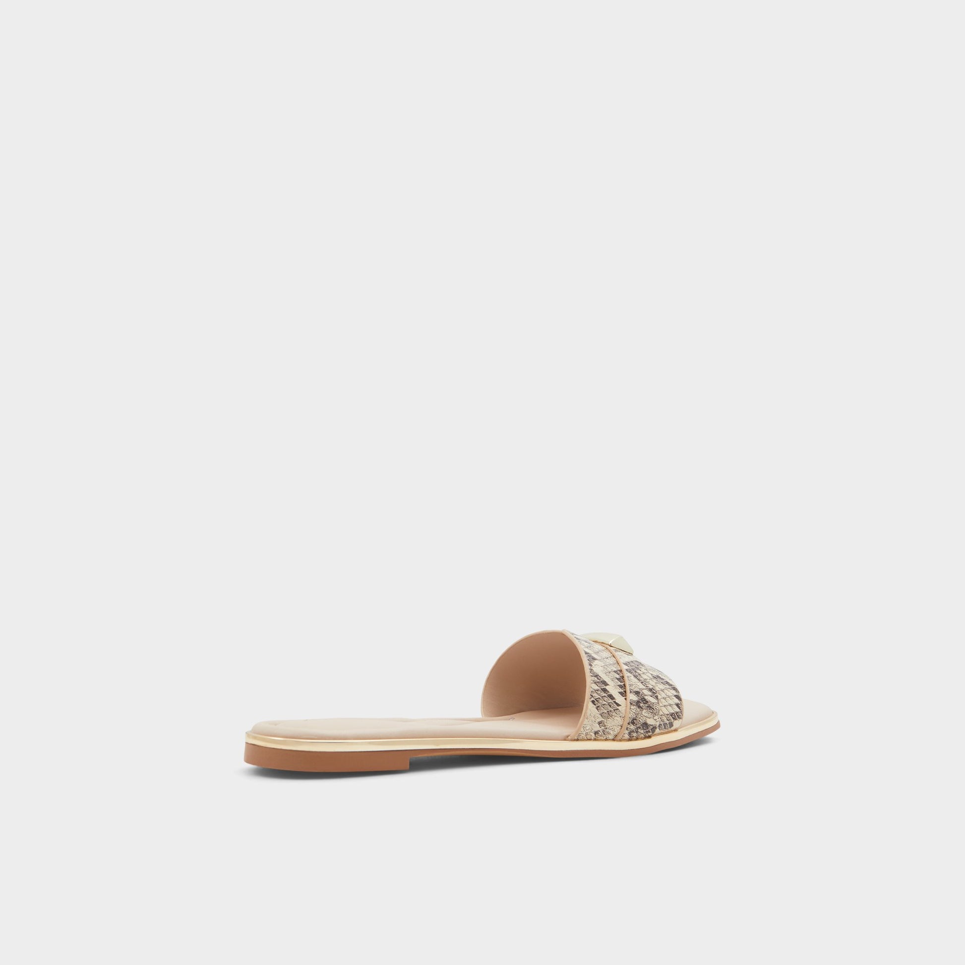 Three-quarter angle of Natural Darine Slide sandal's back side