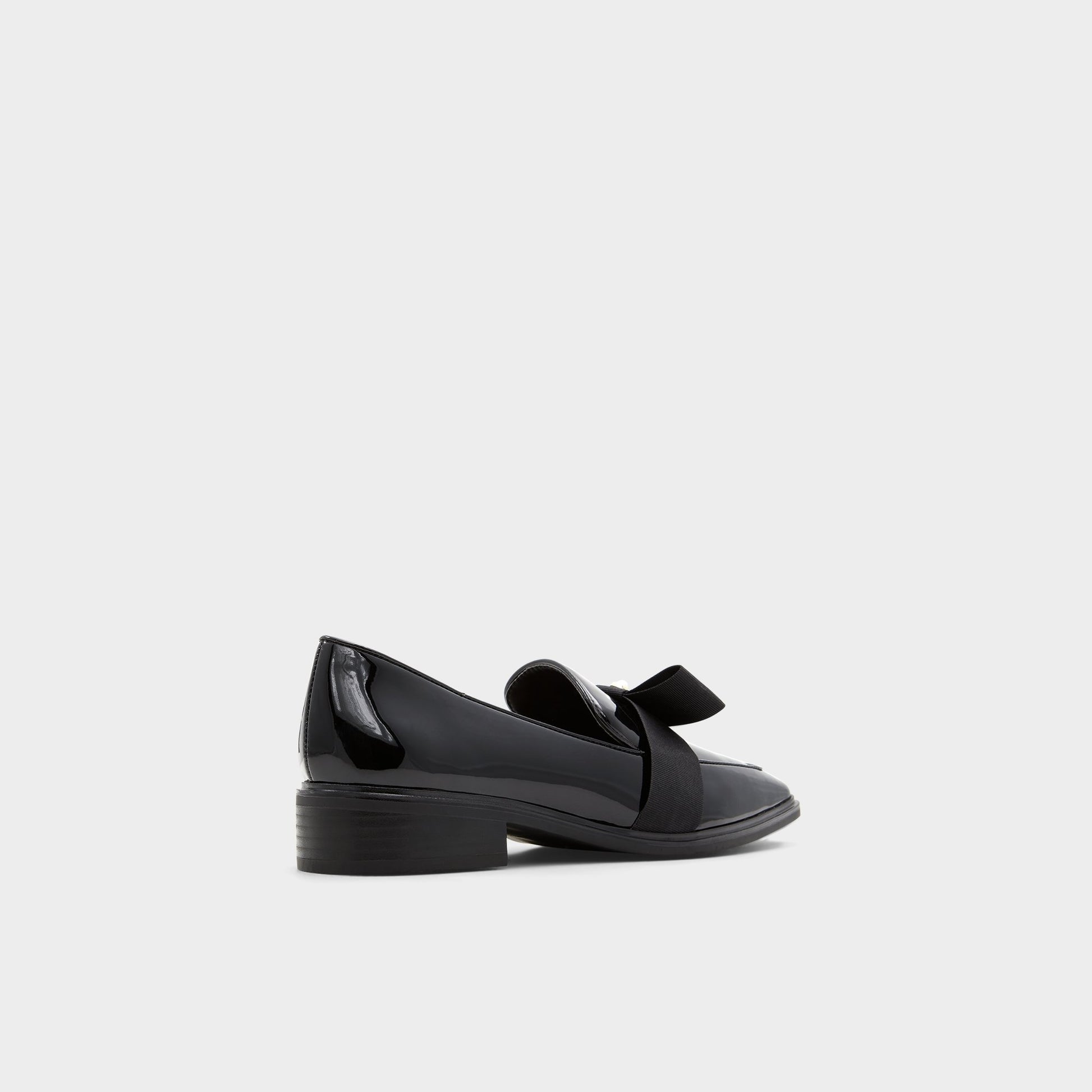 Three-quarter angle of Other Black Hairalle Loafer's back side