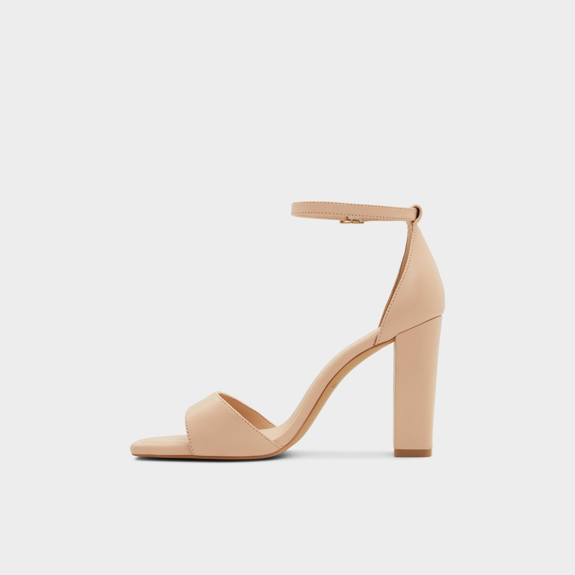 Side view of Beige Enaegyn Heeled block sandal