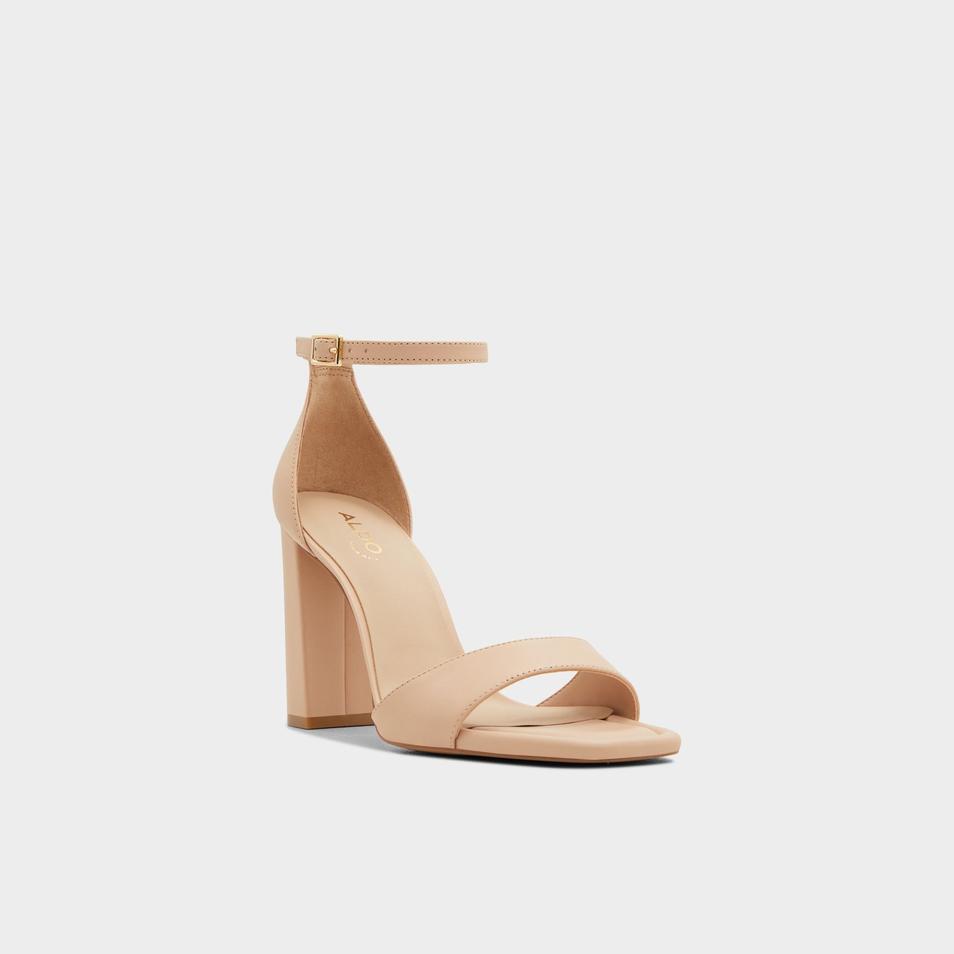 Three-quarter angle of Beige Enaegyn Heeled block sandal's front side