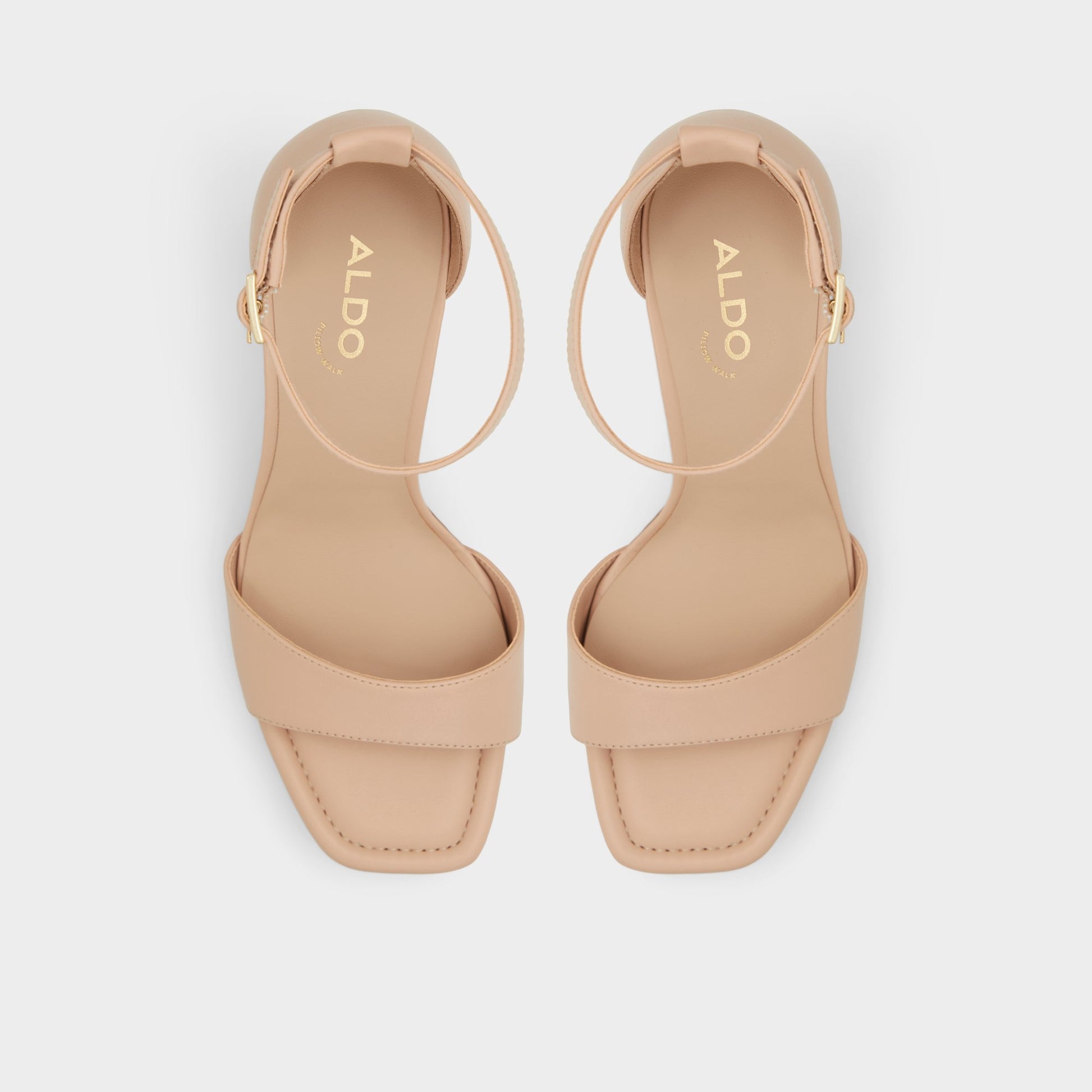 Top-down view of the Beige Enaegyn Heeled block sandal
